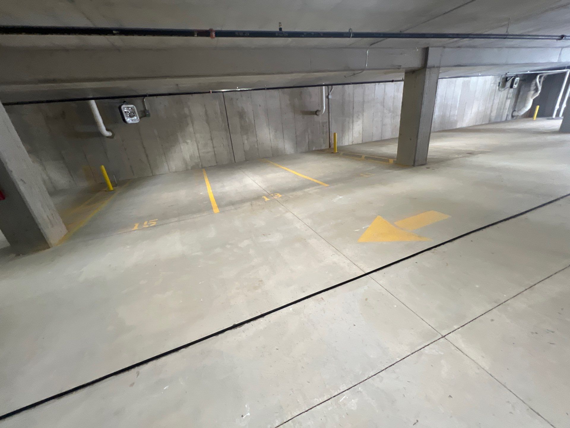 Parking garage using Hot water by Northern Power Washing LLC.
