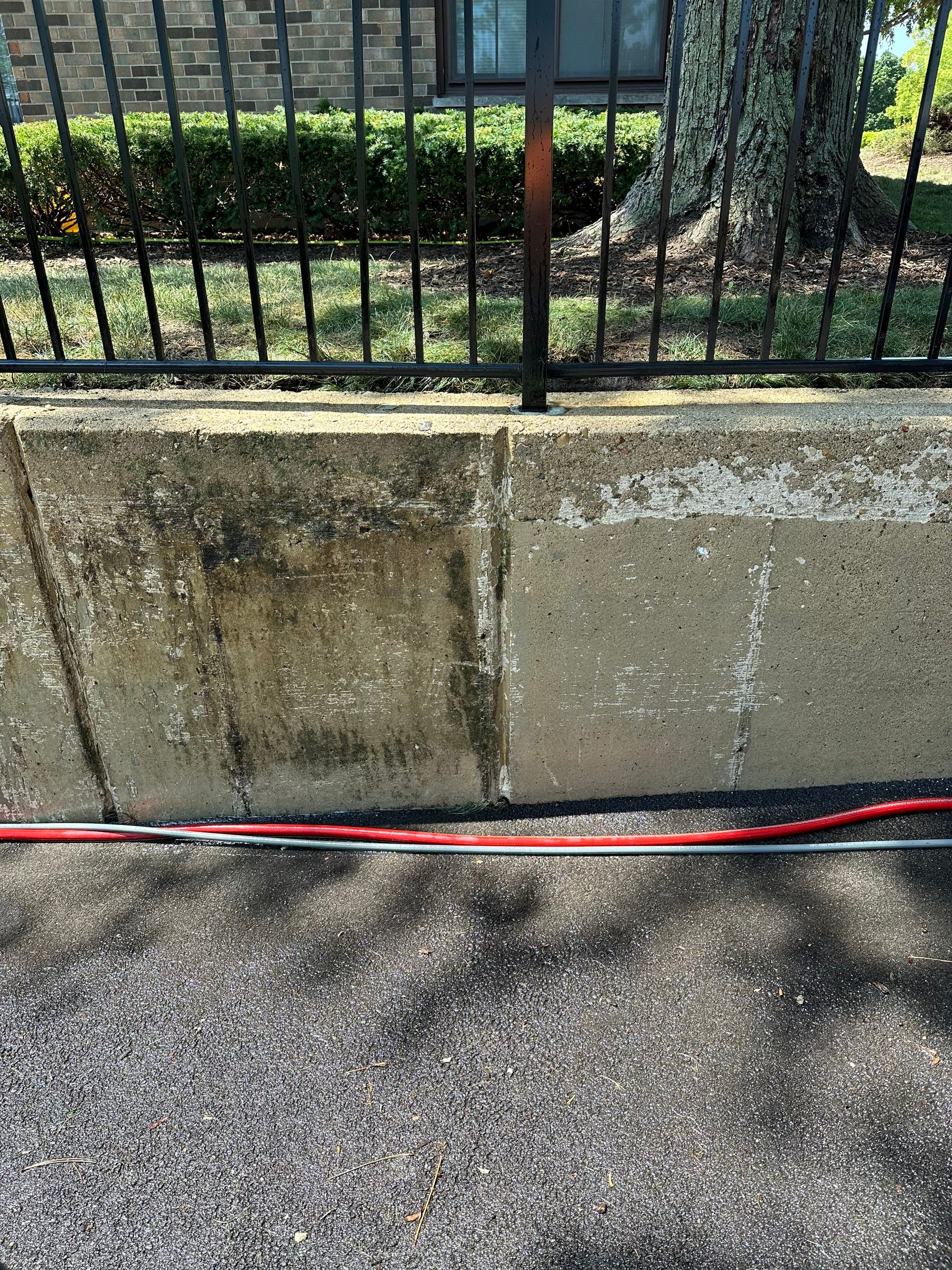 Parking garage using Hot water by Northern Power Washing LLC.