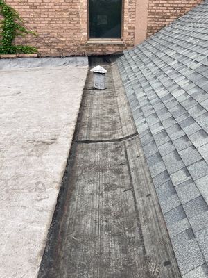Asphalt Roof Replacement with Aluminum Gutter Installation