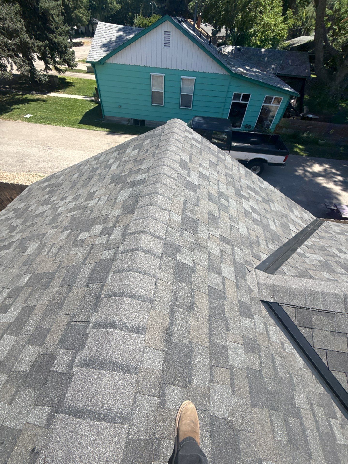 Residential Roof Replacement With Gray Architectural Shingles in Boise by Olive Roofing