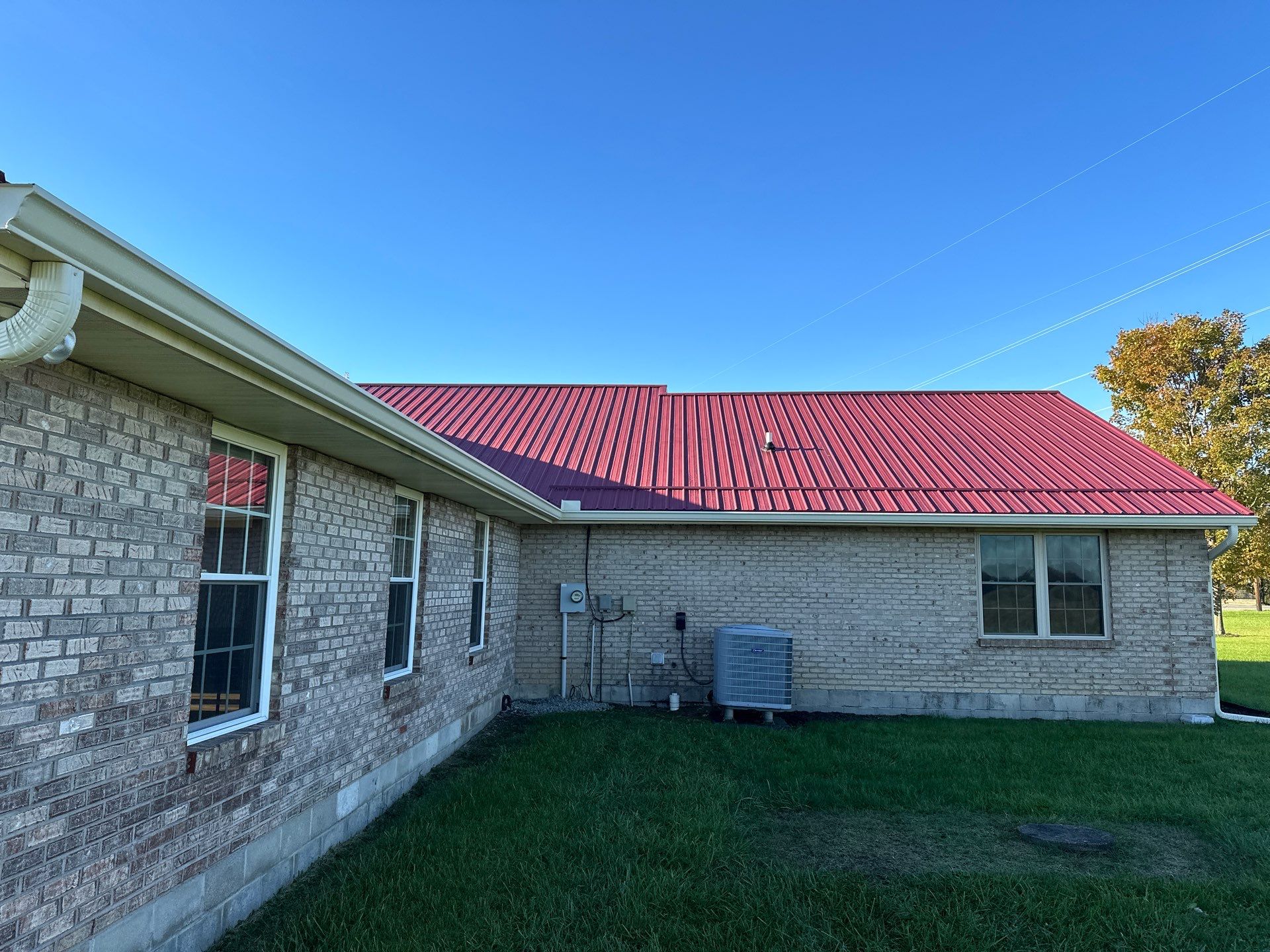 Residential Roofing Installation using Performance Panel Metal - Burgandy by RoofX 