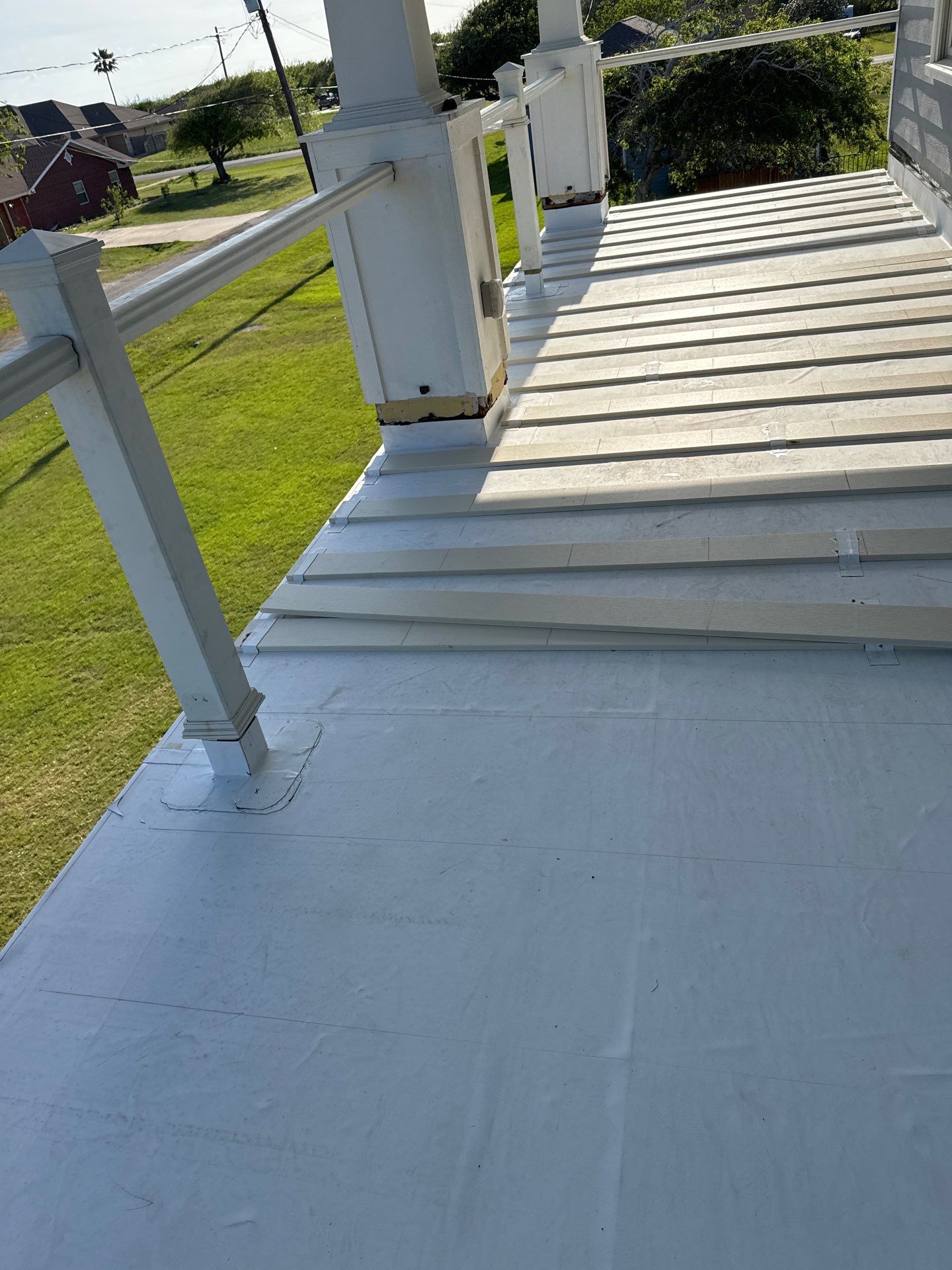 Walk Out Patio Cover by Bayfront Roofing and Construction