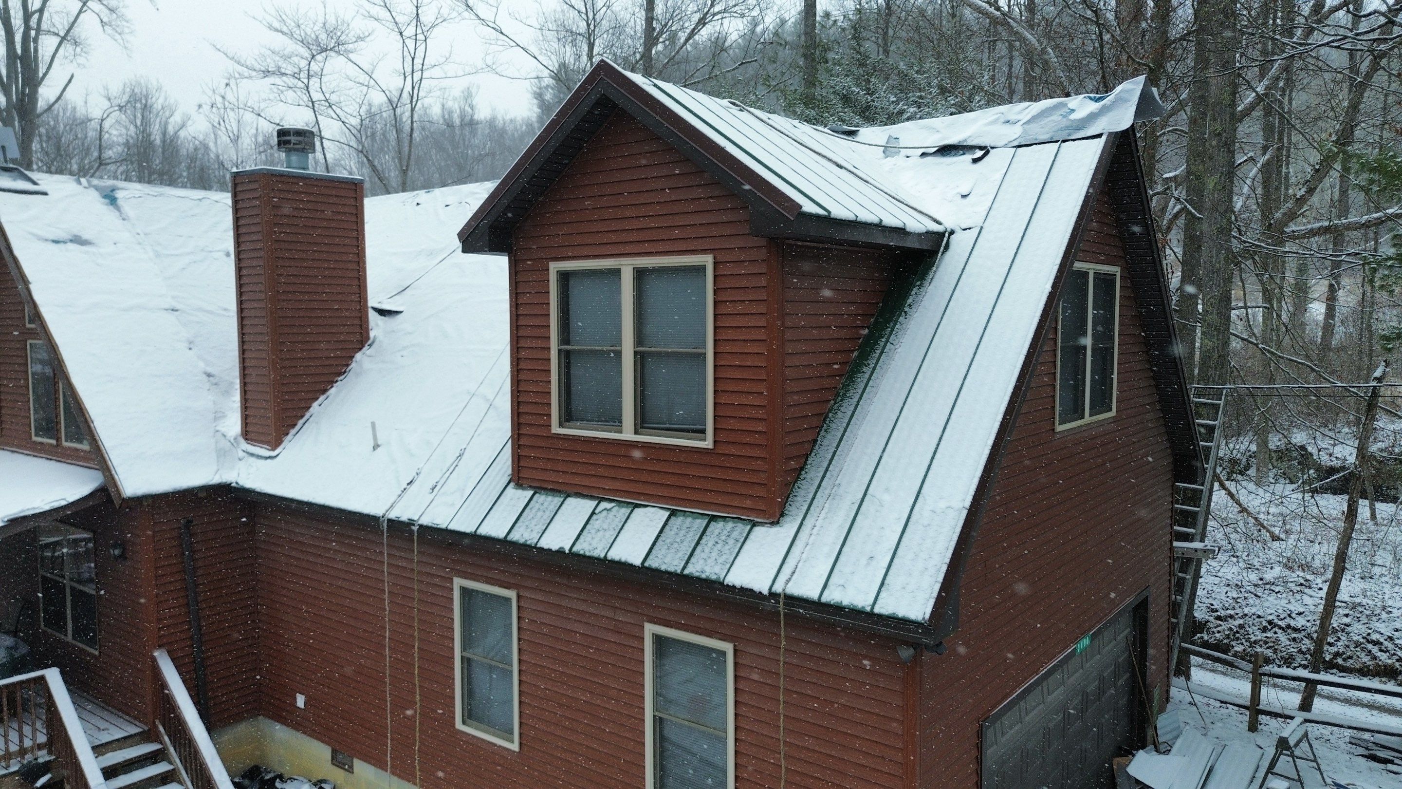 Residential Roofing Installation using Standing Seam Metal - 4766 by Rainstoppers Roofing