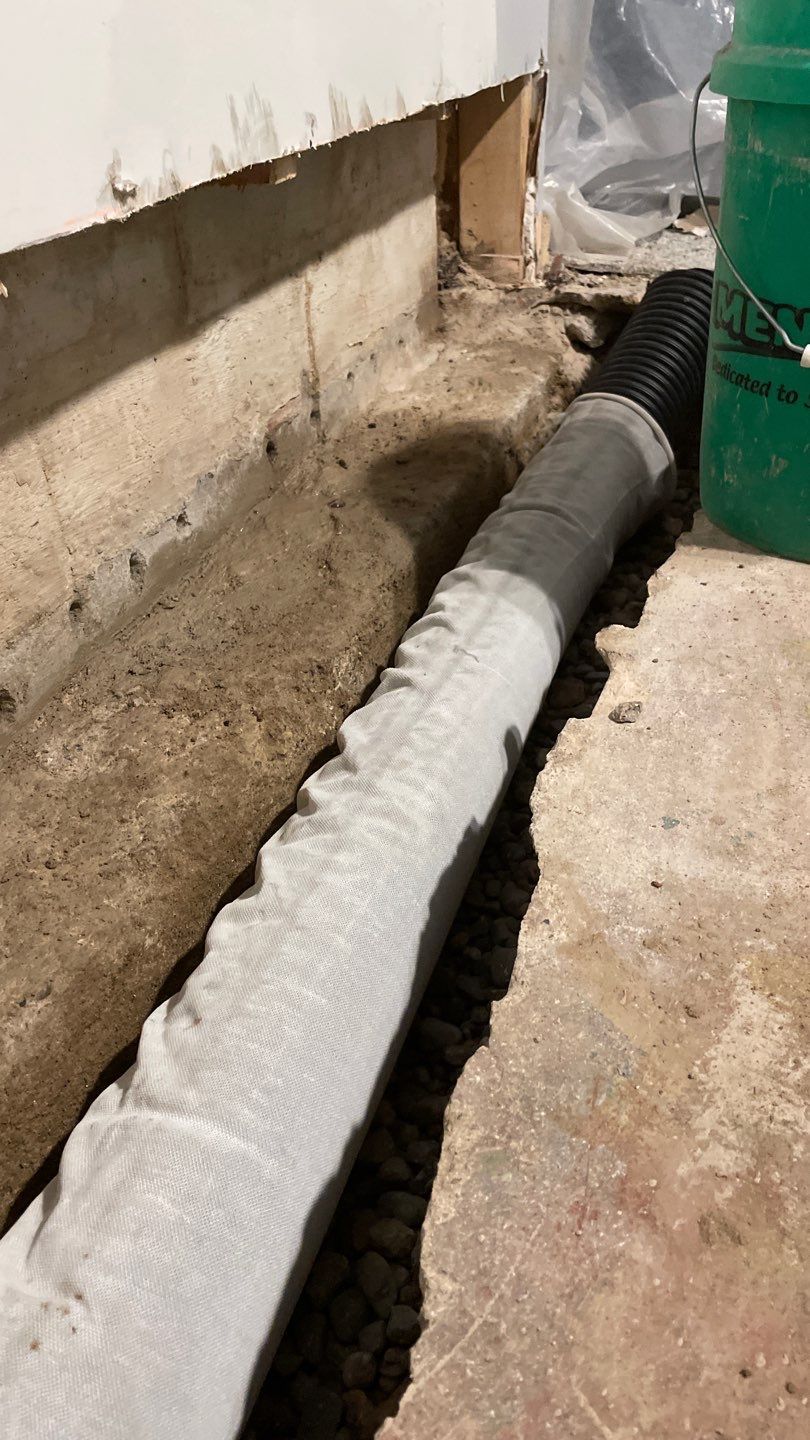 Extending the Drain Tile System for Igor by Waterproofing Northeast