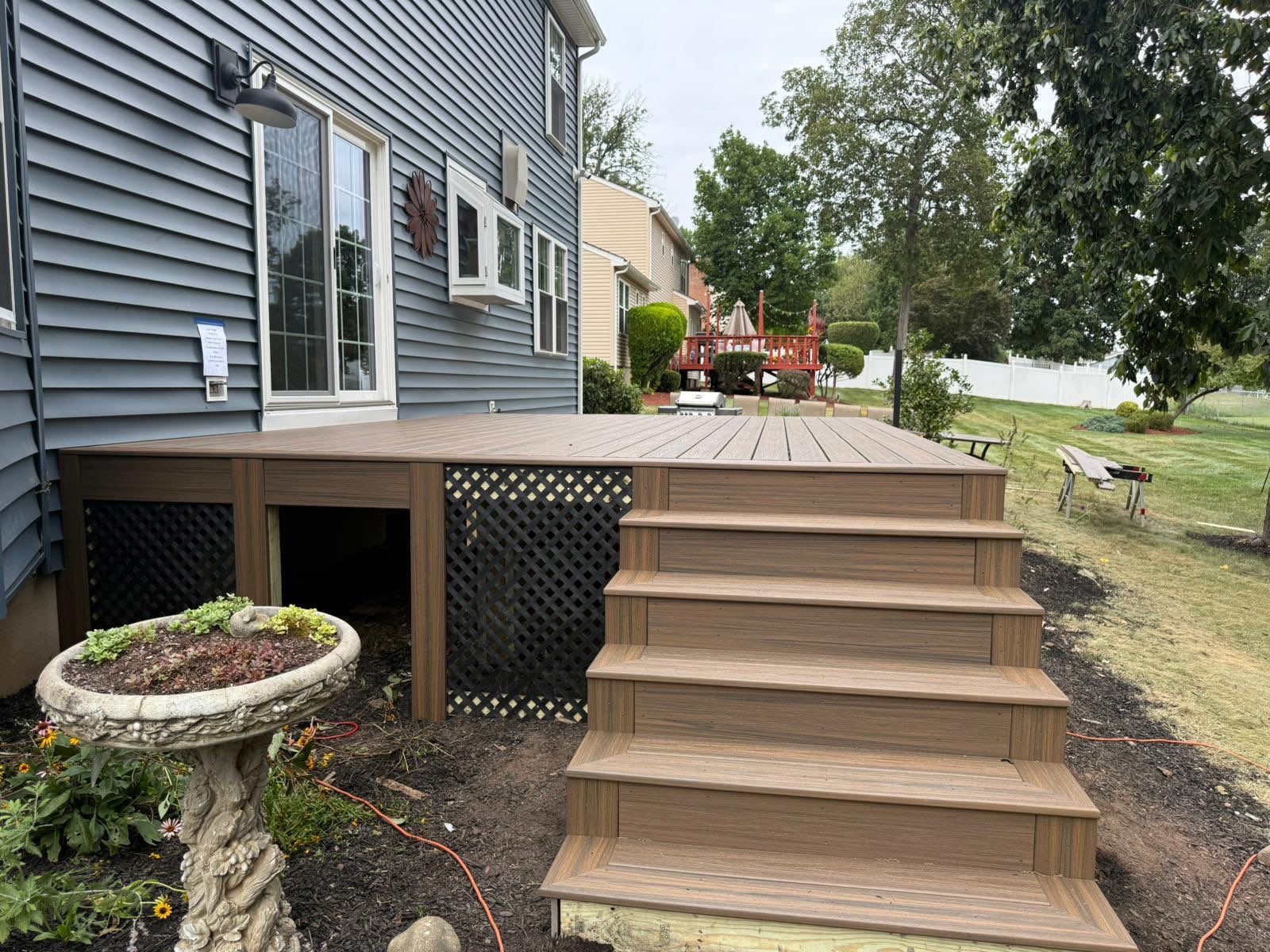 Deck resurface with Trex and cable rails by deck guardian