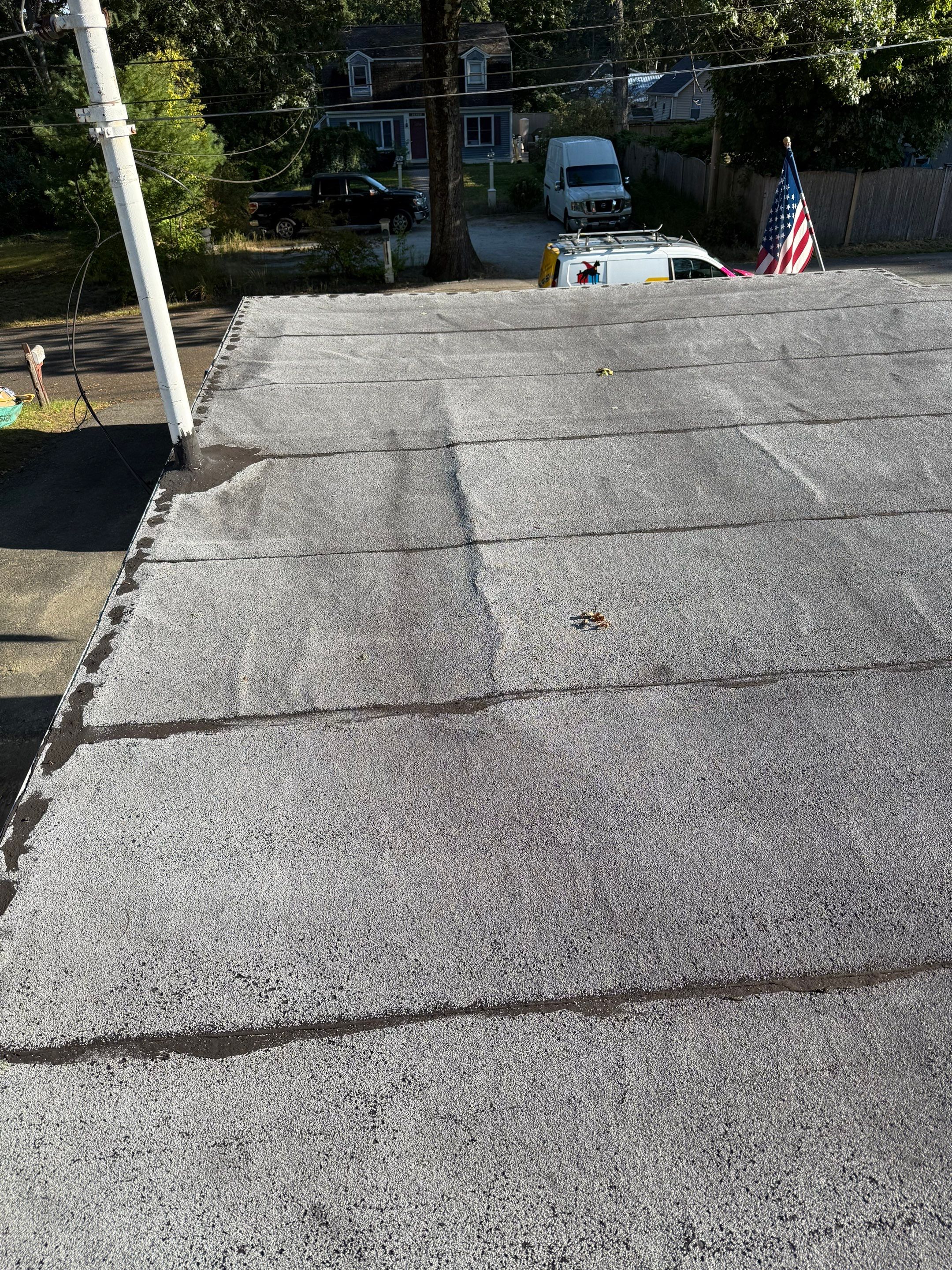 Westford EPDM Flat Roof with Gutter & Soffit/Fascia Replacement by Mighty Dog Roofing of Greater Middlesex County