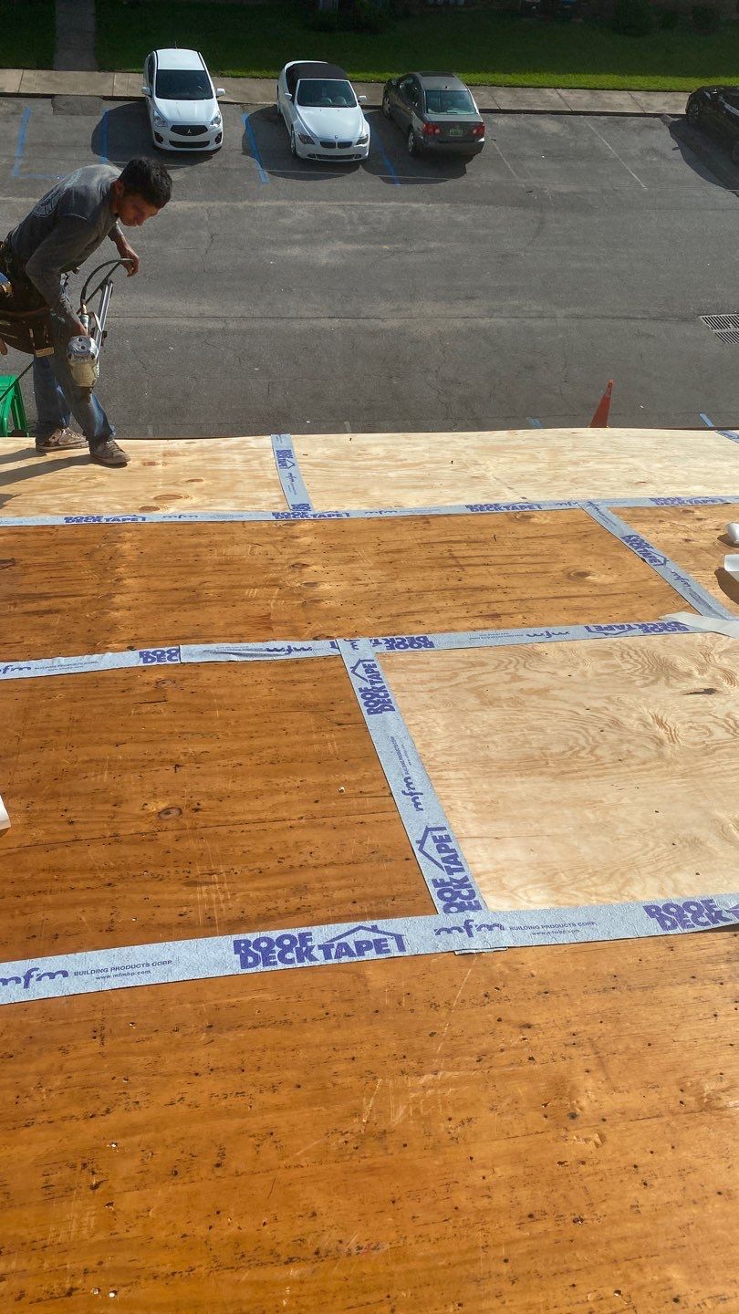 Commercial Roofing Installation using Roof Replacement by American Roofing & Construction LLC