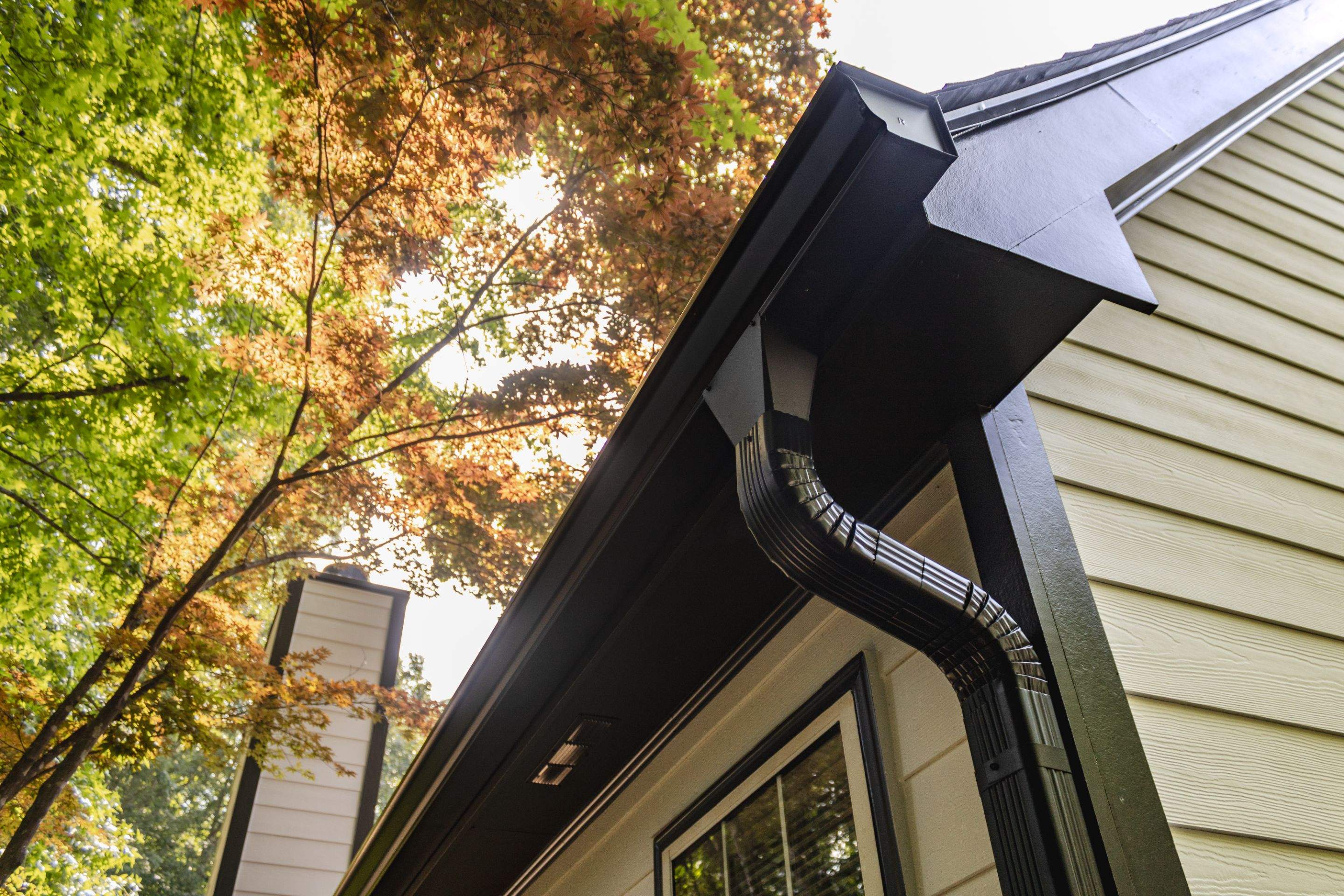 Alpharetta, GA Siding & Exterior Painting with Black Trim Before & After by Nelson Exteriors