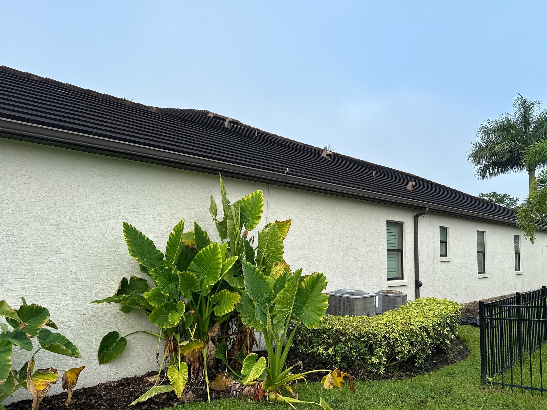 Flat Tile Roof Cleaning, House Wash & Sidewalk Cleaning in Enclave at Country Meadows, Bradenton, FL | Sunshine AquaWash by Sunshine AquaWash