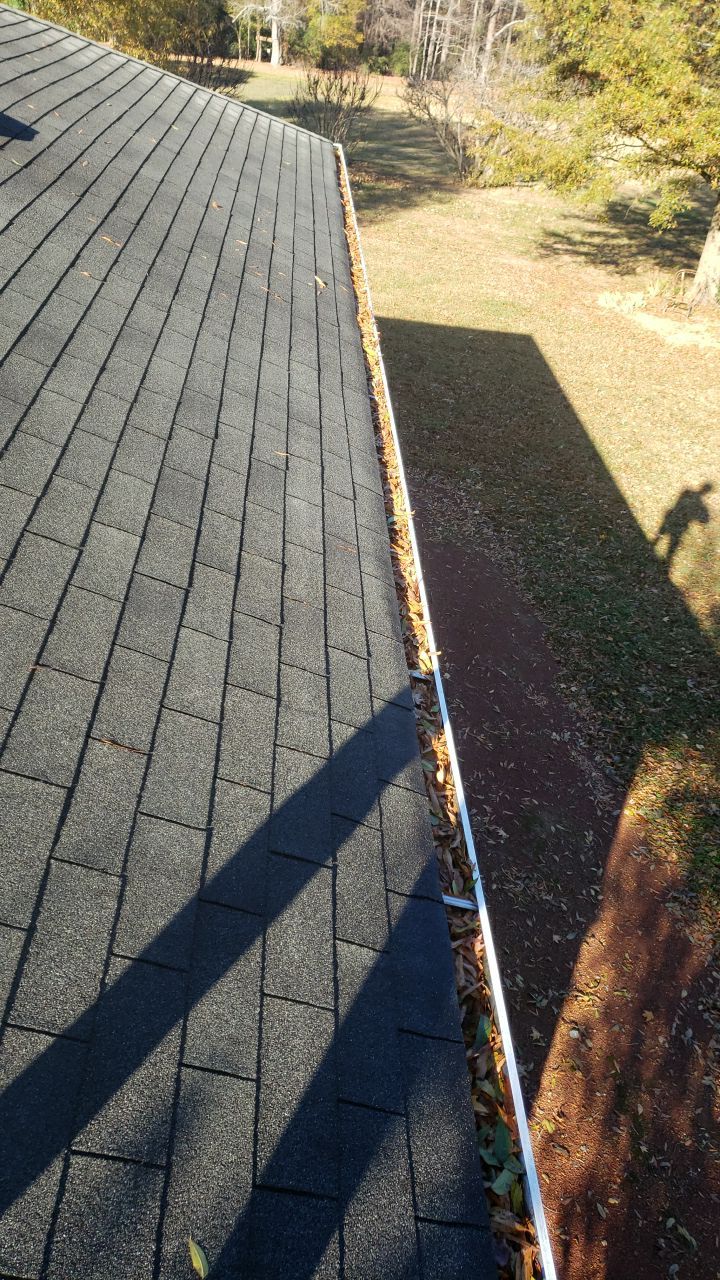 gutter cleaning and house wash and gutter guard installation by Power Wash Masters LLC