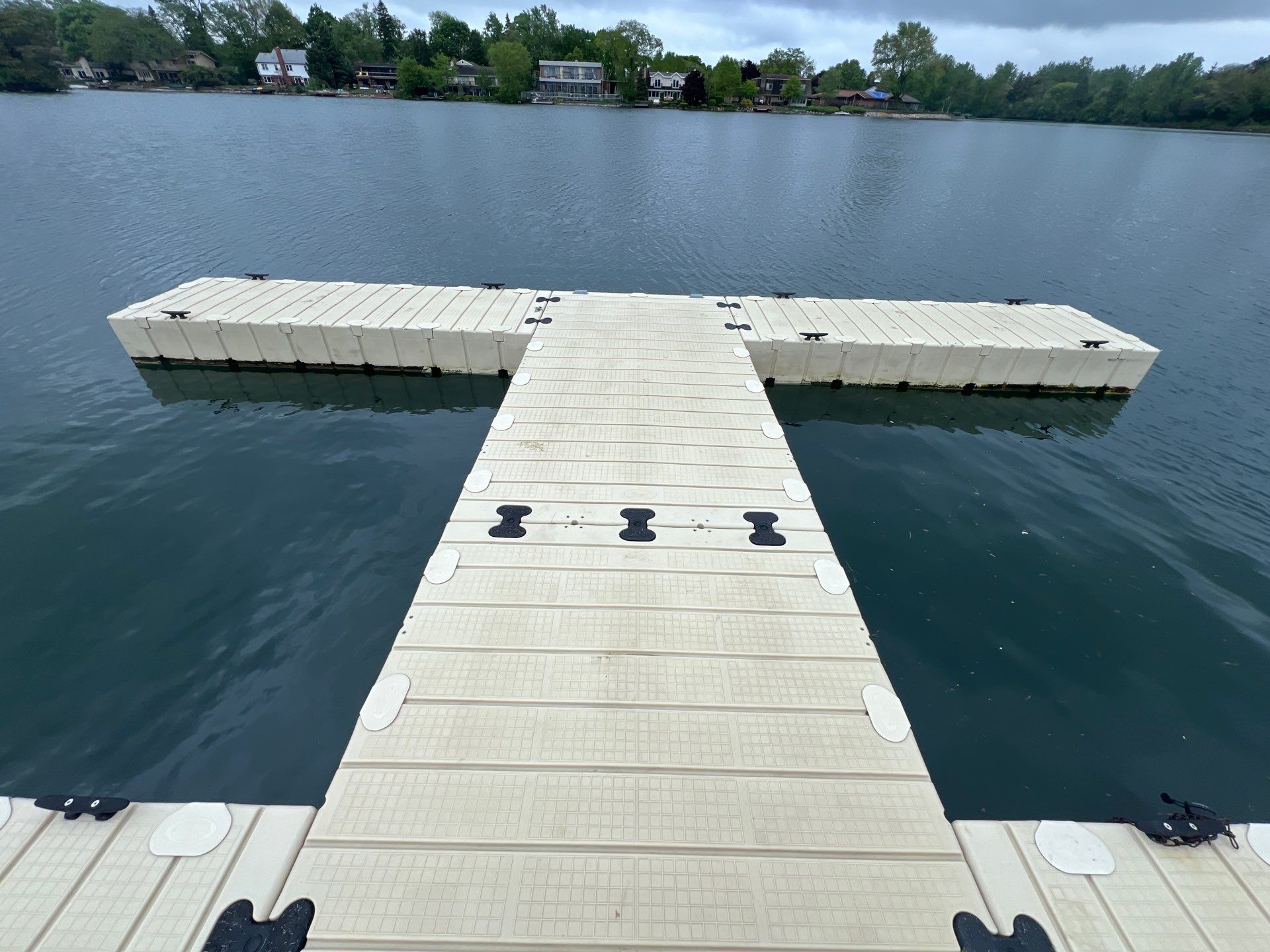 Power washing of floating dock by Northern Power Washing LLC.