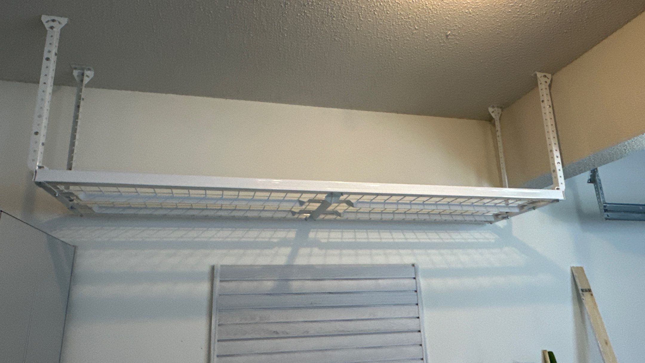 Carly U chose platinum powder coating for her cabinets by Banner Garage