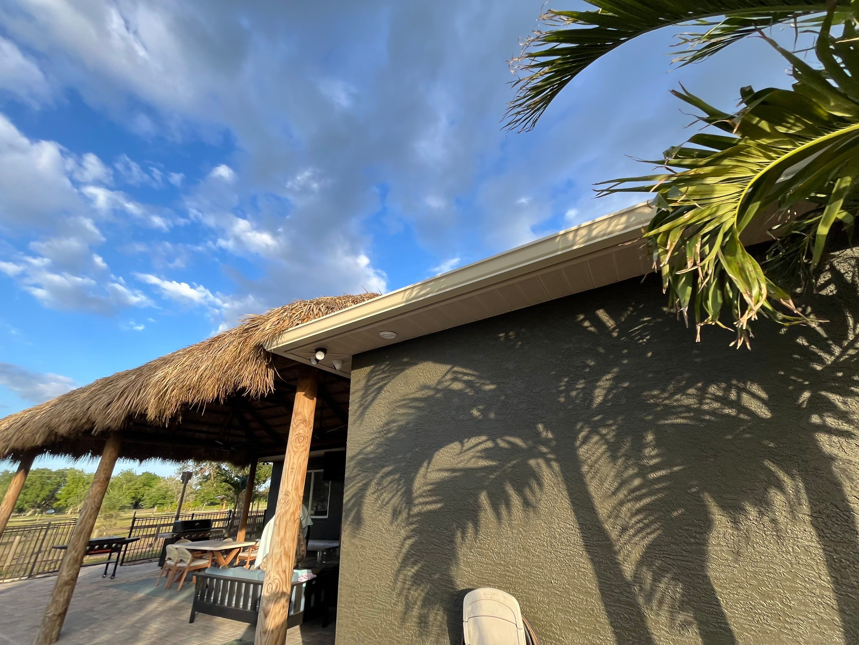  7-inch White seamless gutters and downspouts in Myakka City FL by Gutter Professors