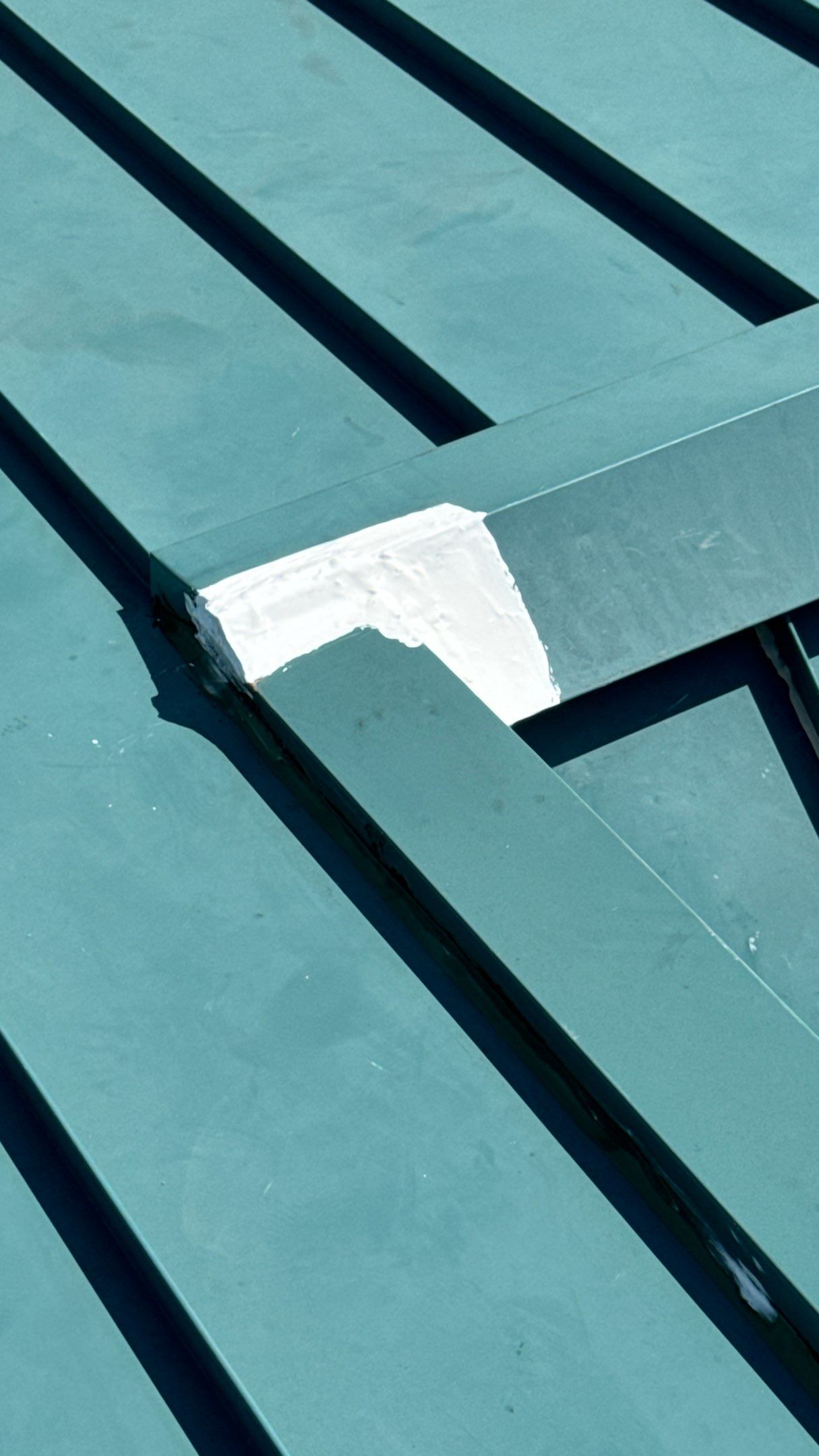 Commercial Roofing Repair using TRP #924 Eterna-Sil Premium Silicone Roof Coating by Harvey Roofing & Construction