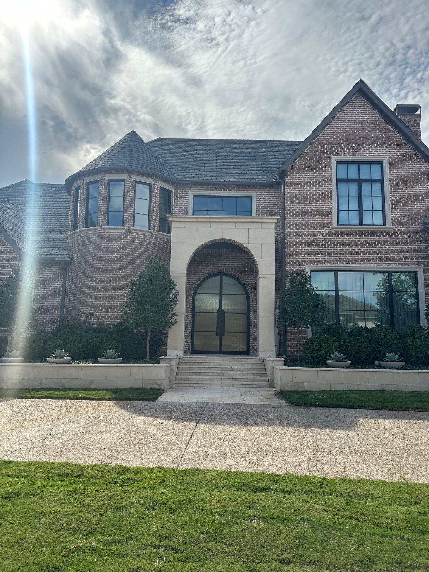 Custom Arched Metal Entry Door Installation in Plano by Solara Custom Living