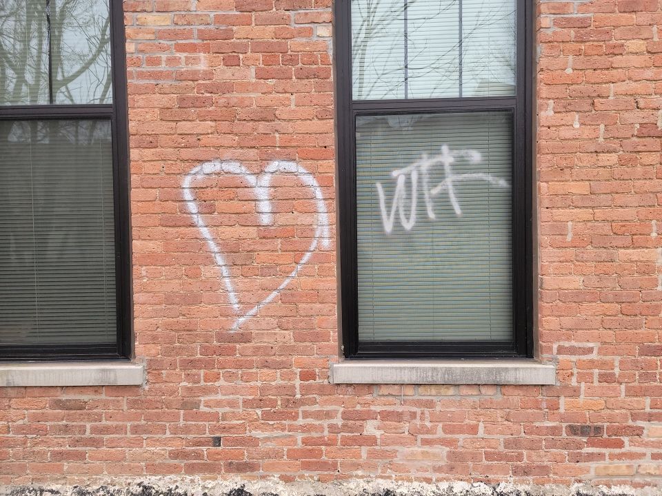 Graffiti removal  using Graffiti remover by Northern Power Washing LLC.