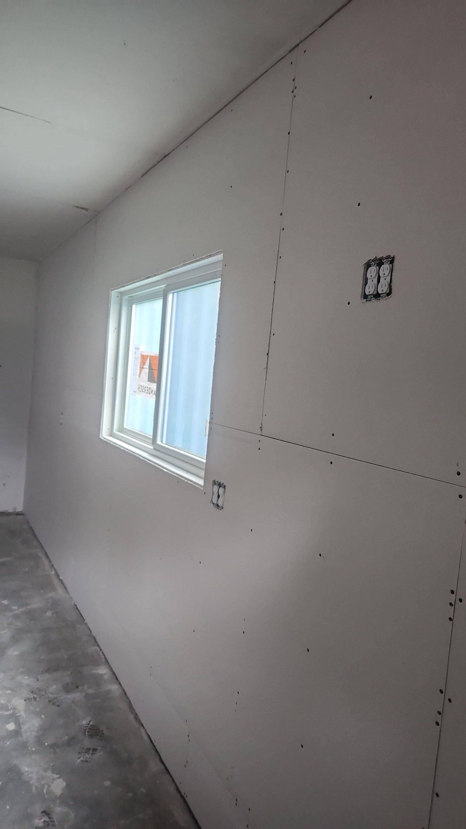 Yankton Garage Remodel with Andersen Window Installation and Drywall
