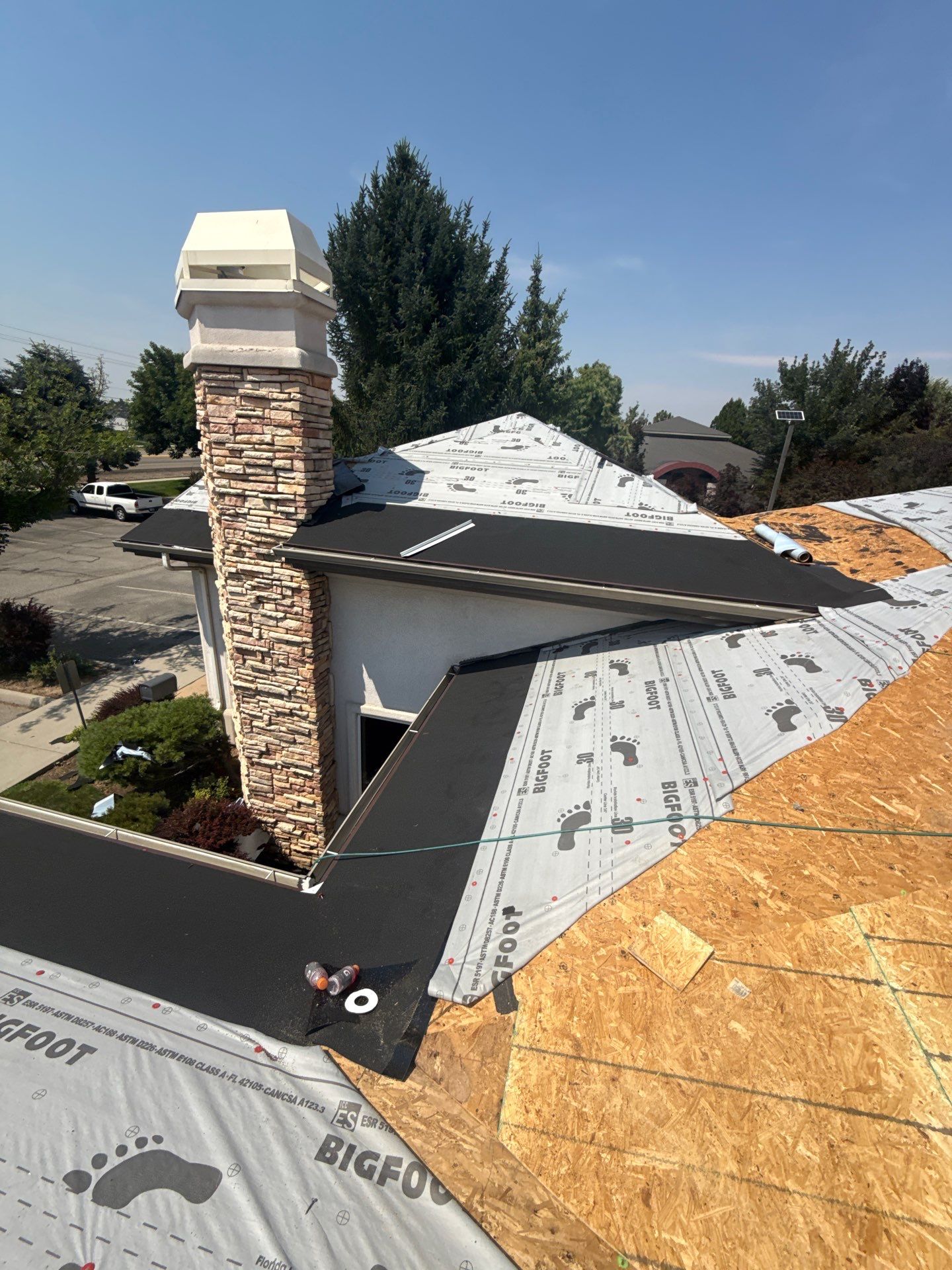 Boise Commercial Roof Replacement with Brown Architectural Shingles by Olive Roofing