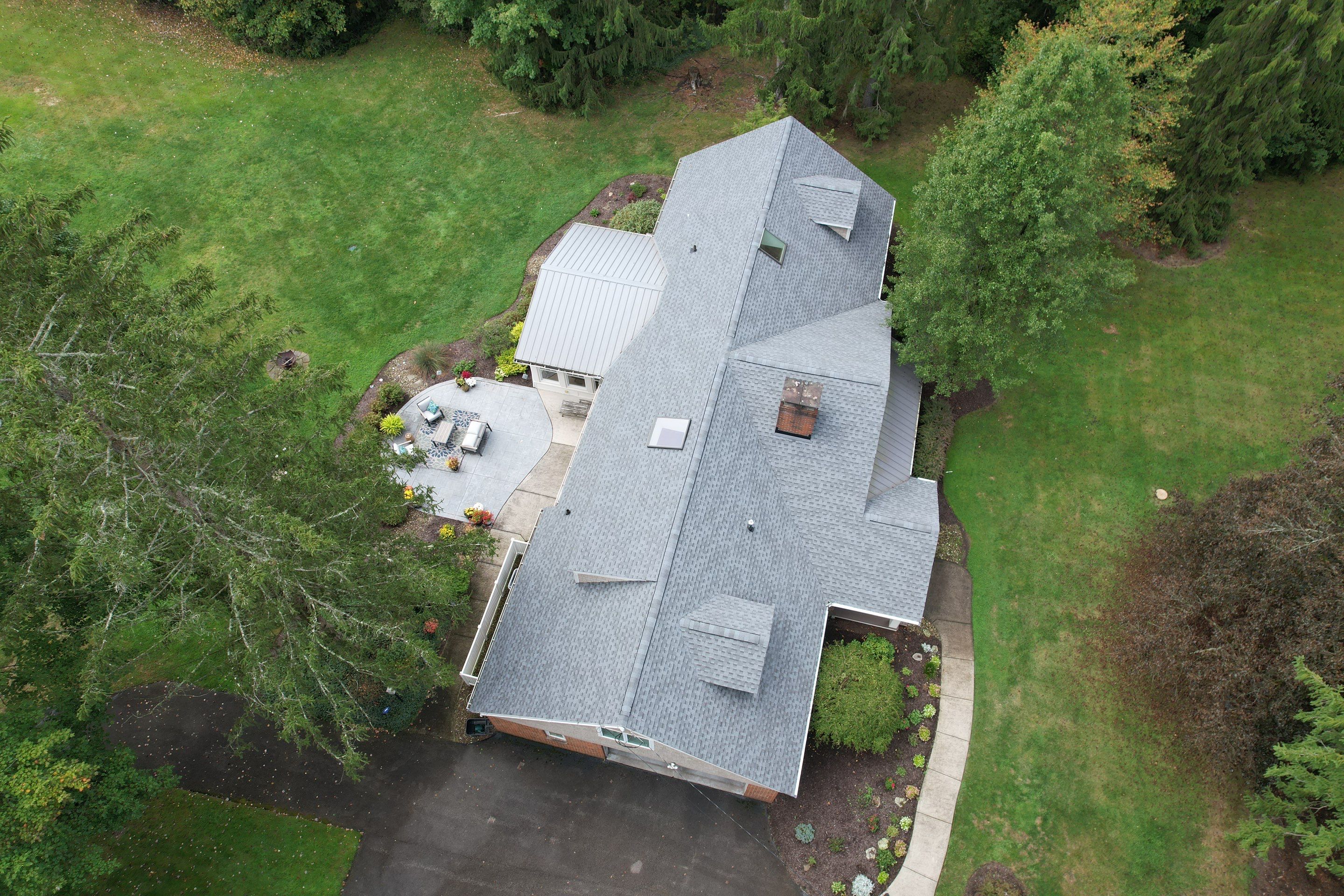 Moreland Hills Roof + Gutters Replacement by Atlas Roofing & Restoration