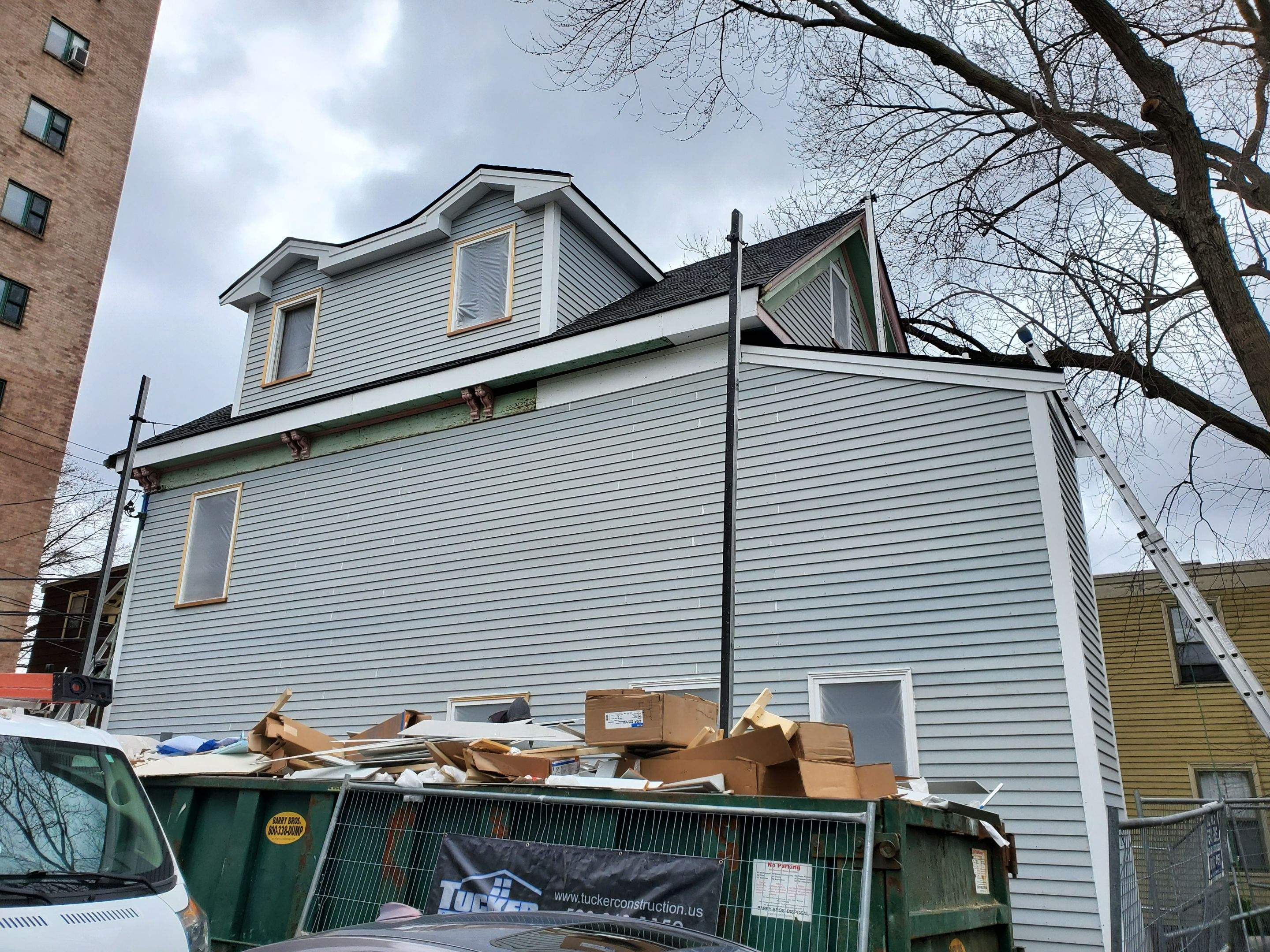 Siding Installation using Wood Clapboards by UBrothers Construction