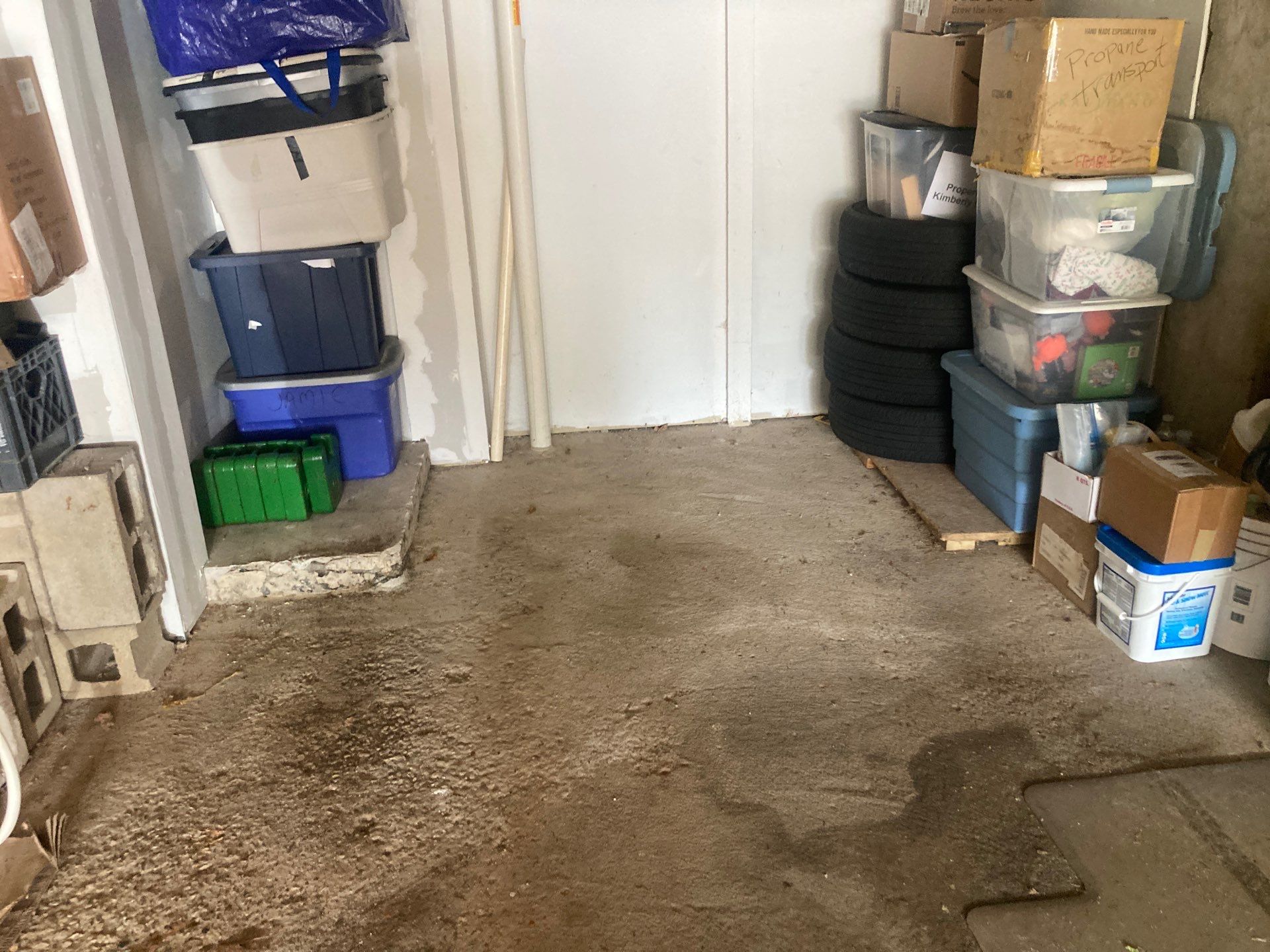 Garage Concrete Floor Coating Transformation by DiGiorgi Roofing and Siding Inc