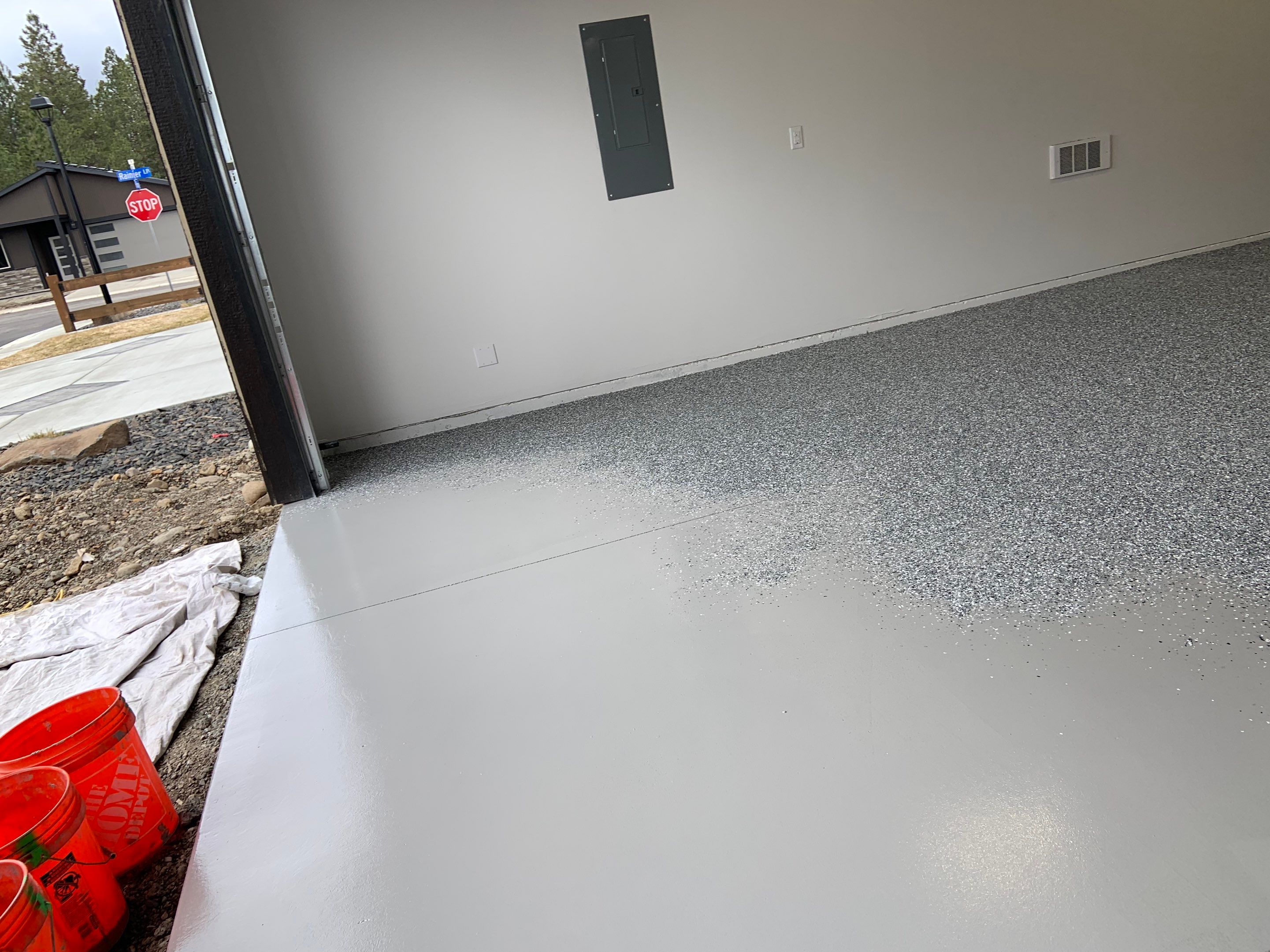Garage Transformation using Smoke by Croc Coatings, LLC