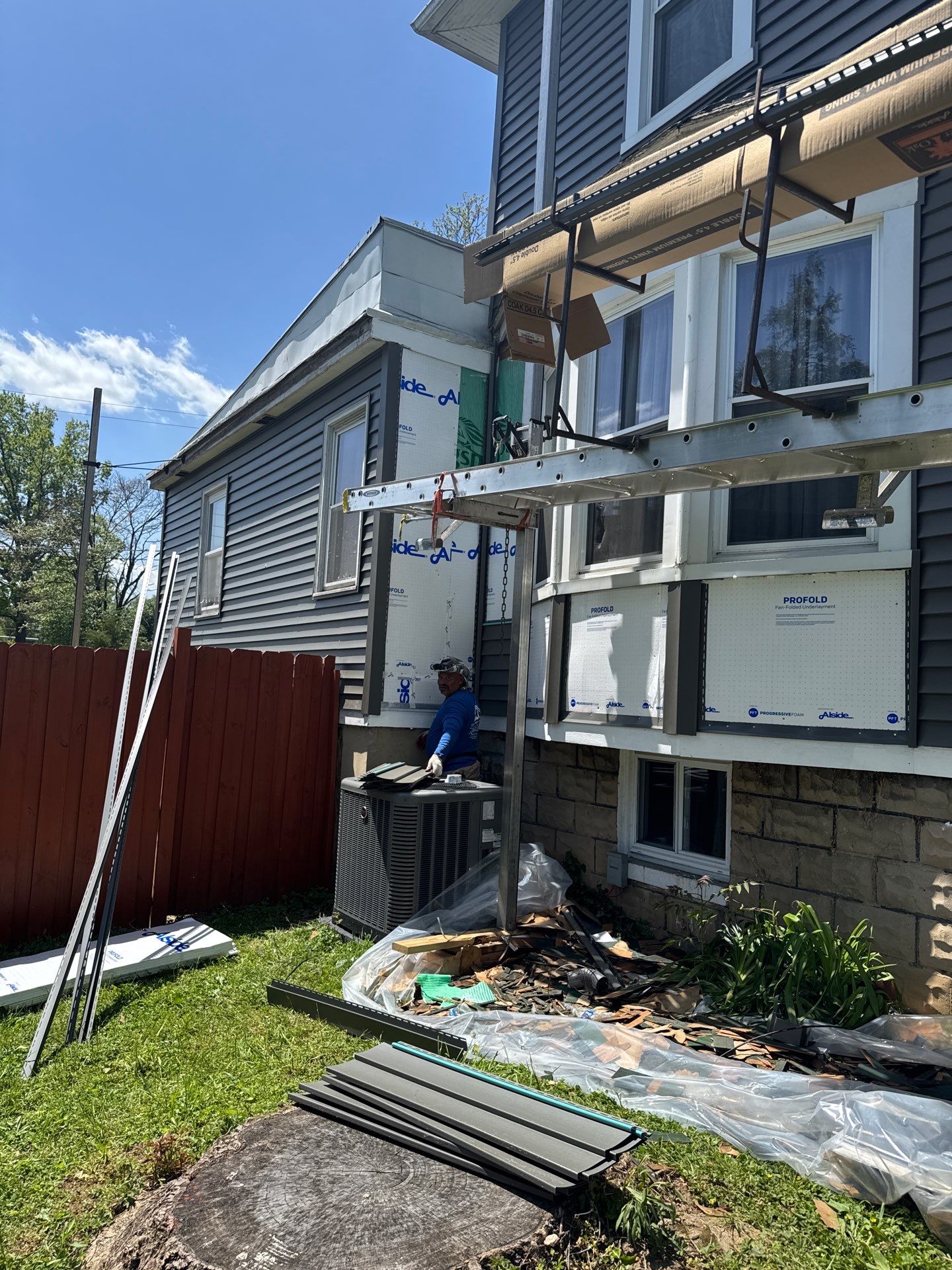 New siding & New Gutters by Alpha Design Services