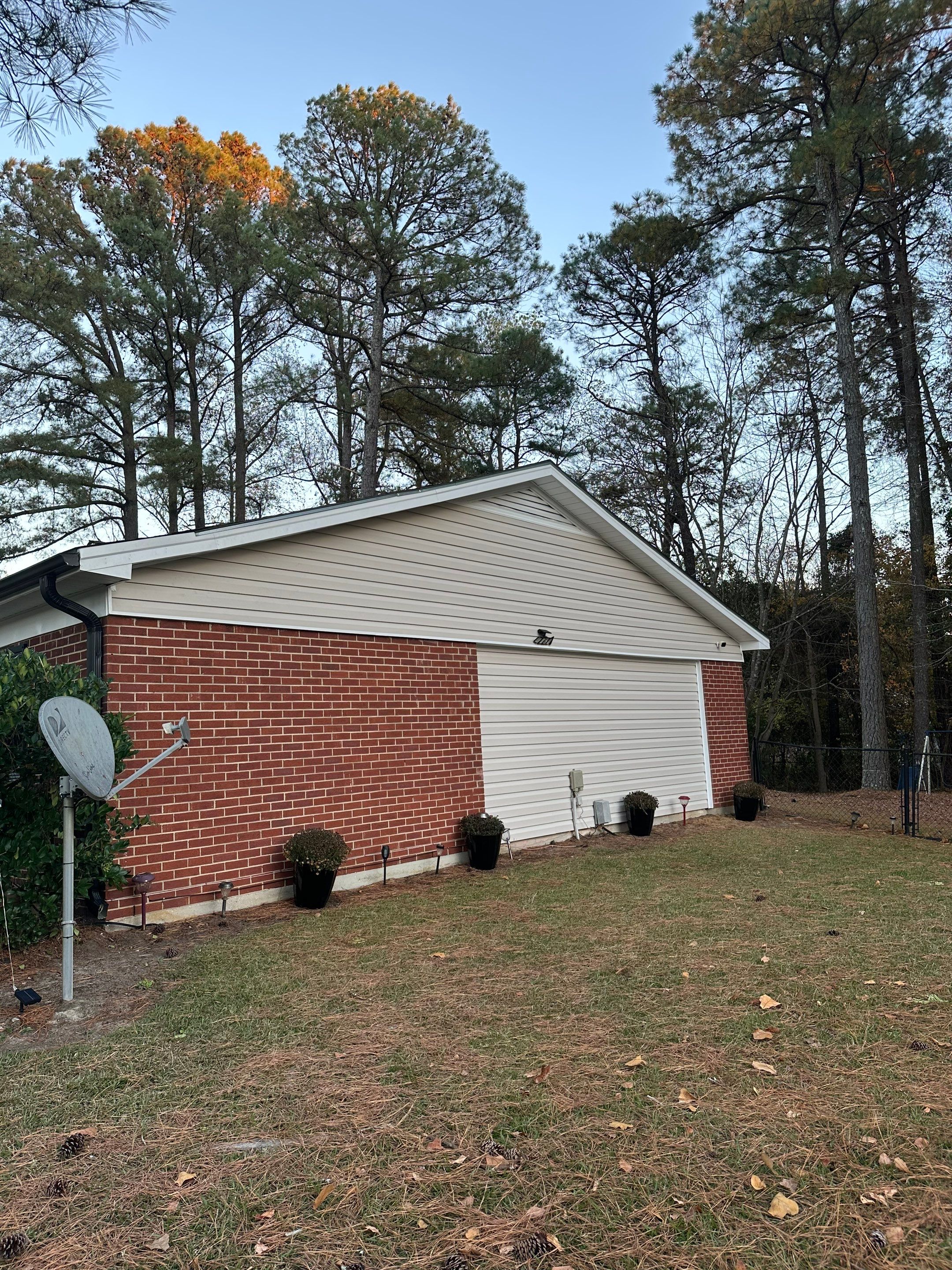 Vinyl Siding Replacement and Trim Capping for Fayetteville Home by The Remodeling Company