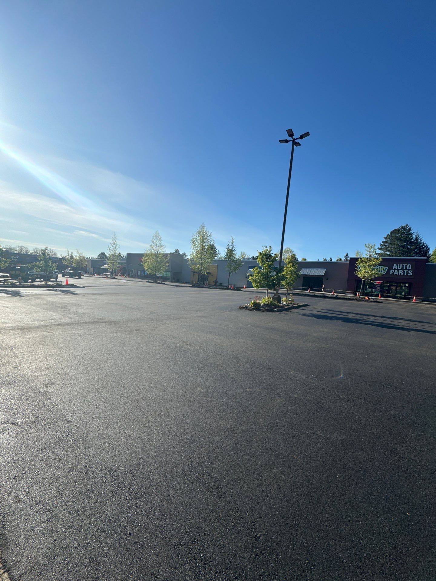 Colliers - Woodinville New Asphalt Parking Lot by Jireh Asphalt & Concrete Inc 