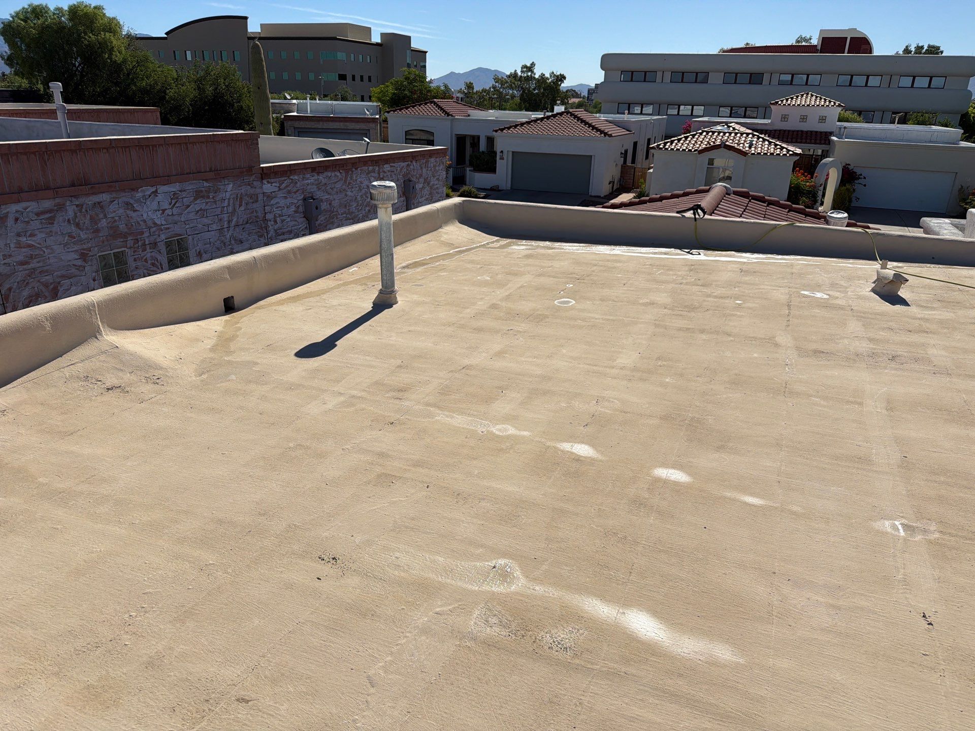 Tucson Residential Roof Restoration with Tile and Elastomeric Coating by West Coast Roofing AZ