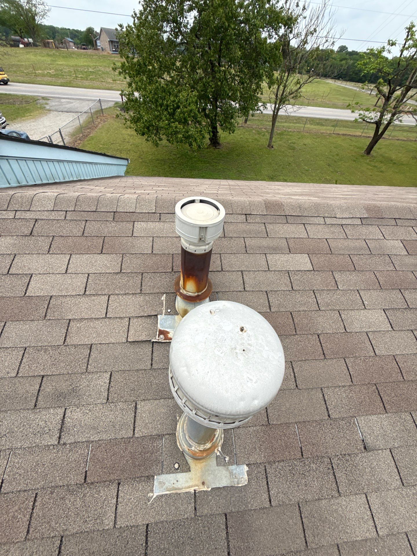 Roof replacement & Storm Door by In & Out Construction & Remodeling, LLC