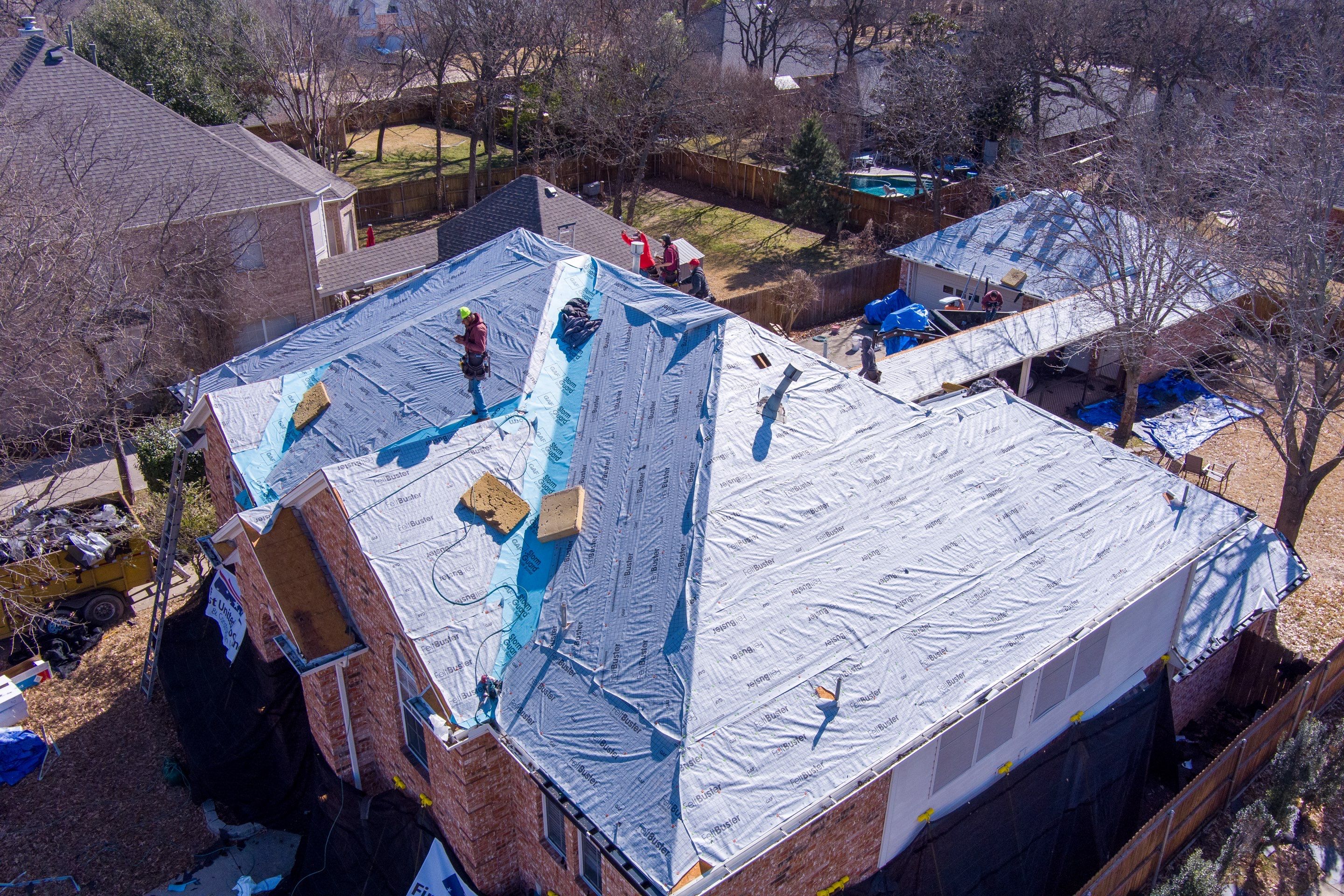 Major storm damage required full roof replacement along with other exterior repairs by First United Roofing & Construction