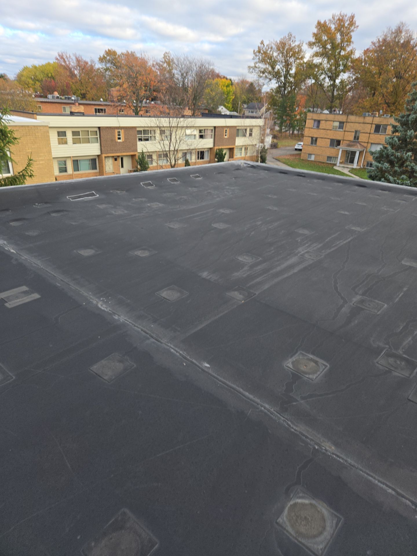 Commercial Roofing Installation using Duro-Last 50 mil PVC by 3 Daughters Construction 