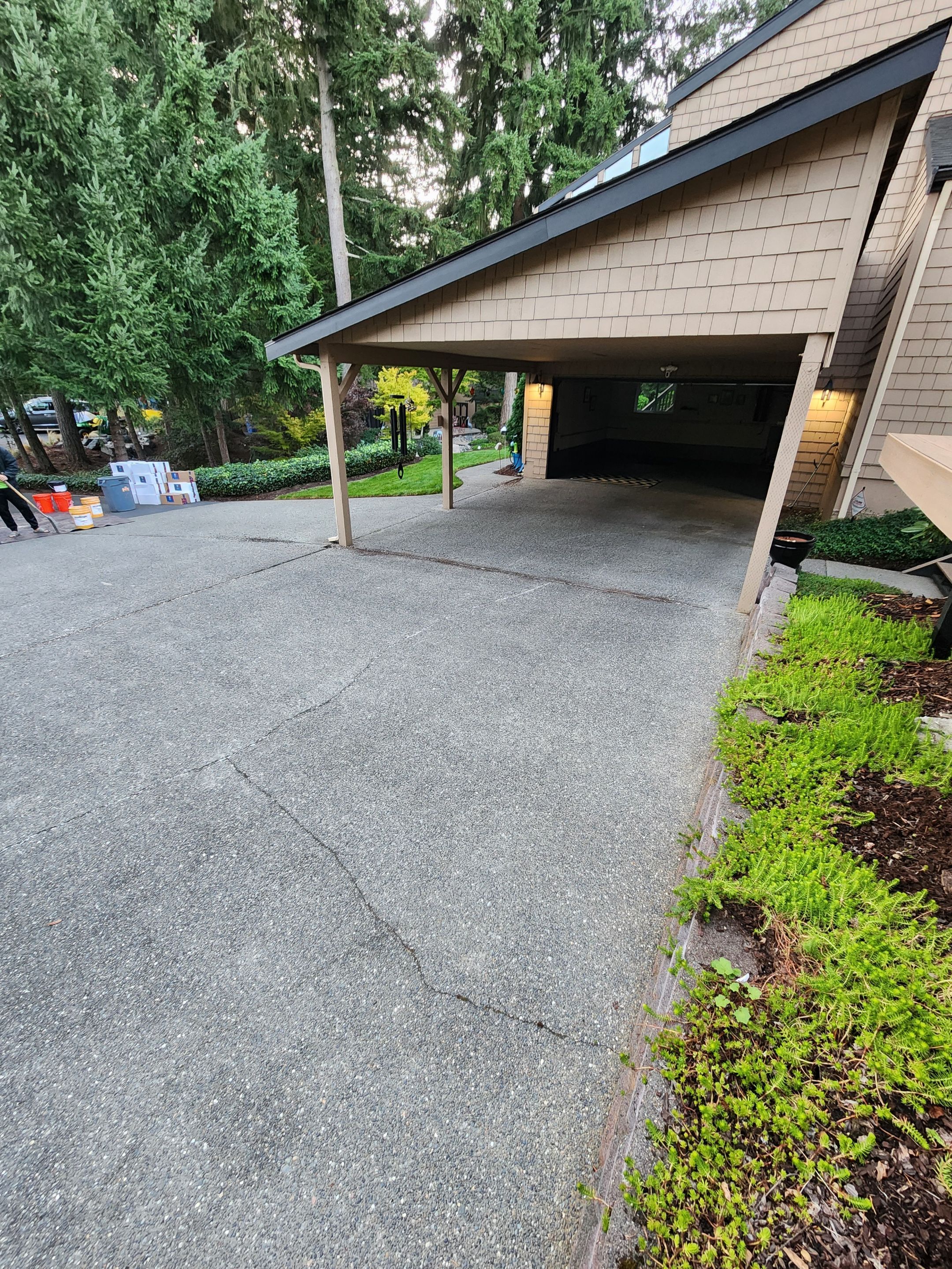 Walkway and driveway by Concrete Coating Experts Inc.