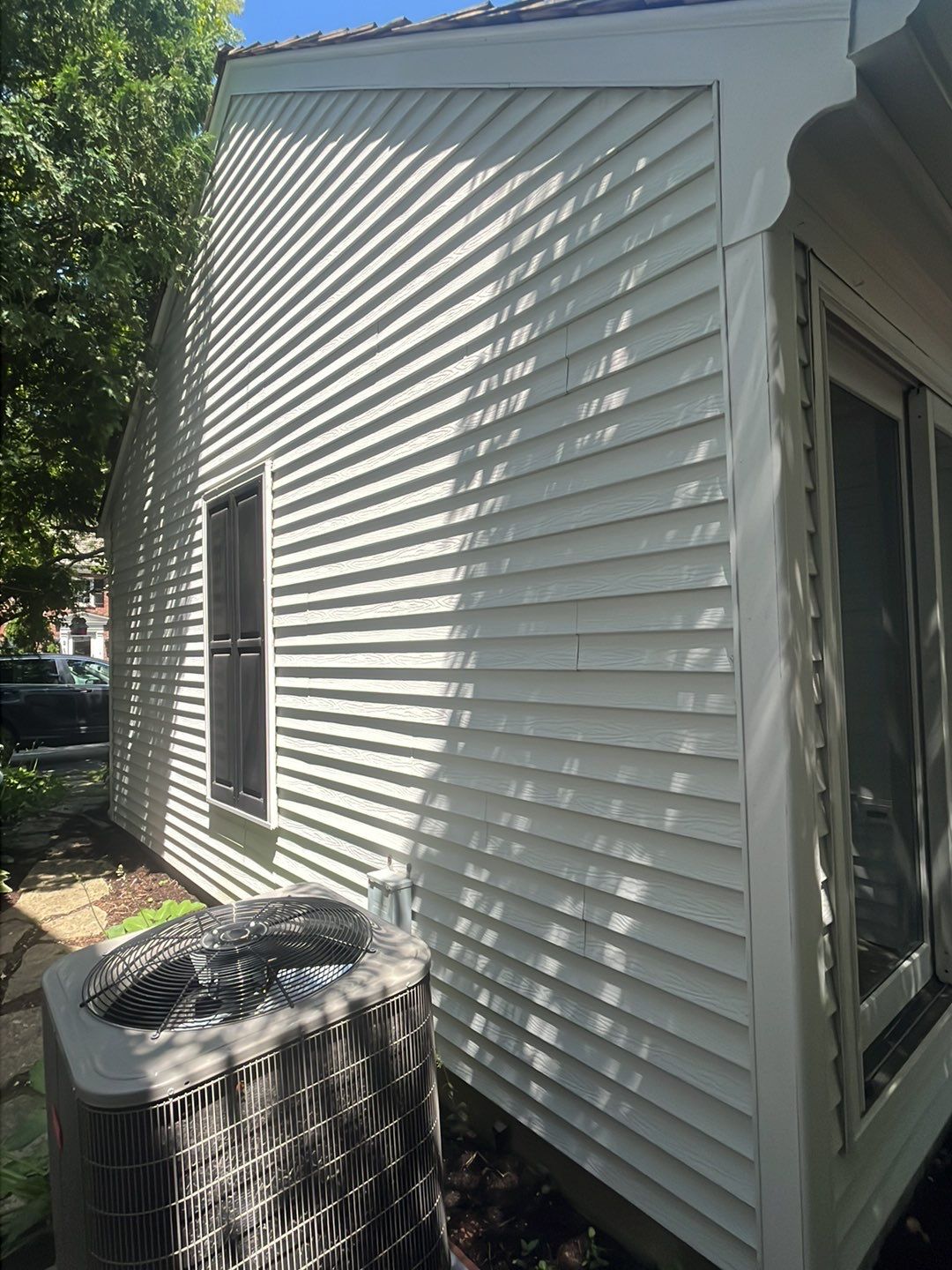 Housewashing  using Algaecide, soft wash soap by Northern Power Washing LLC.