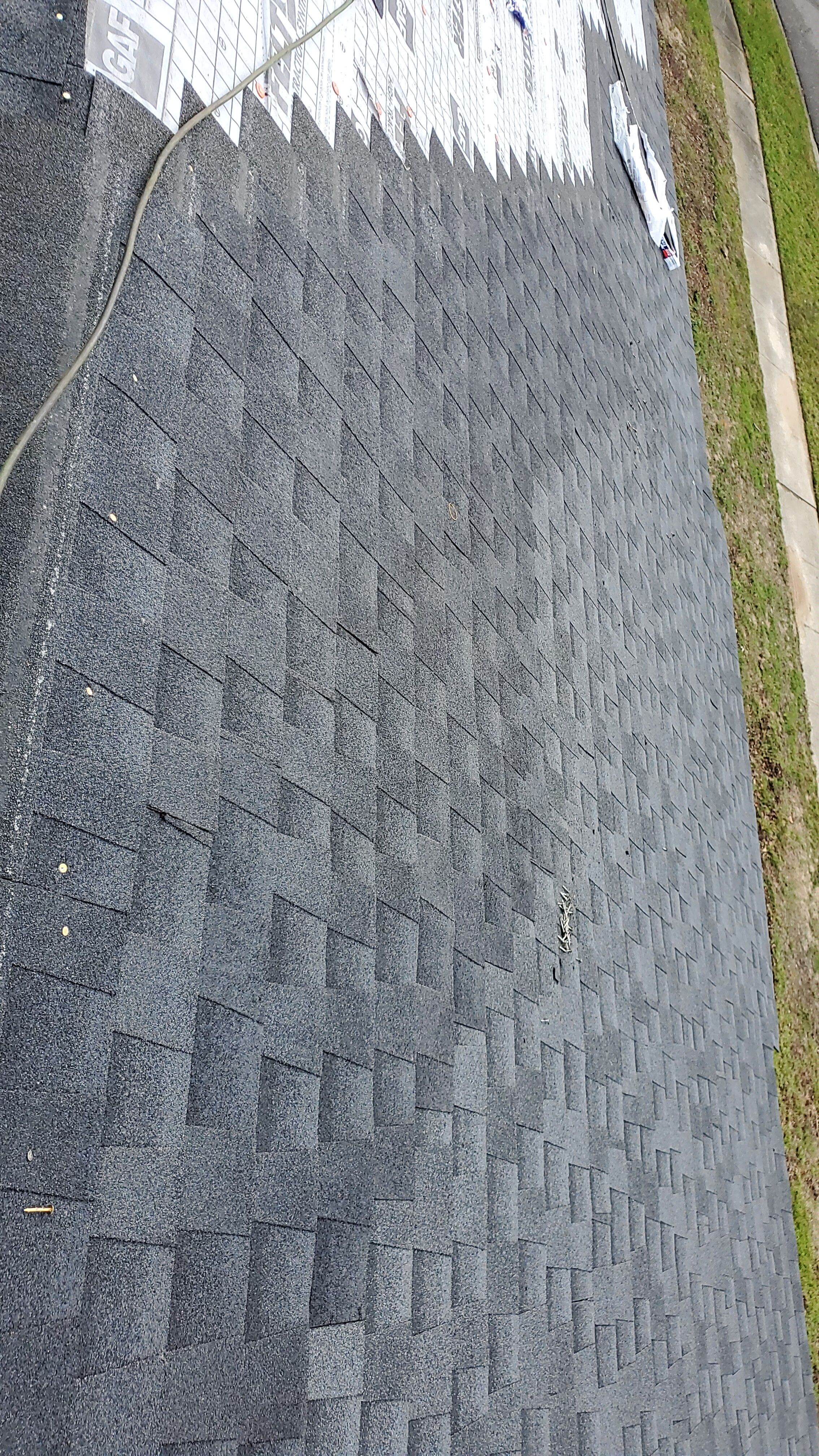 Residential Roofing Installation using Roof Replacement by American Roofing & Construction LLC