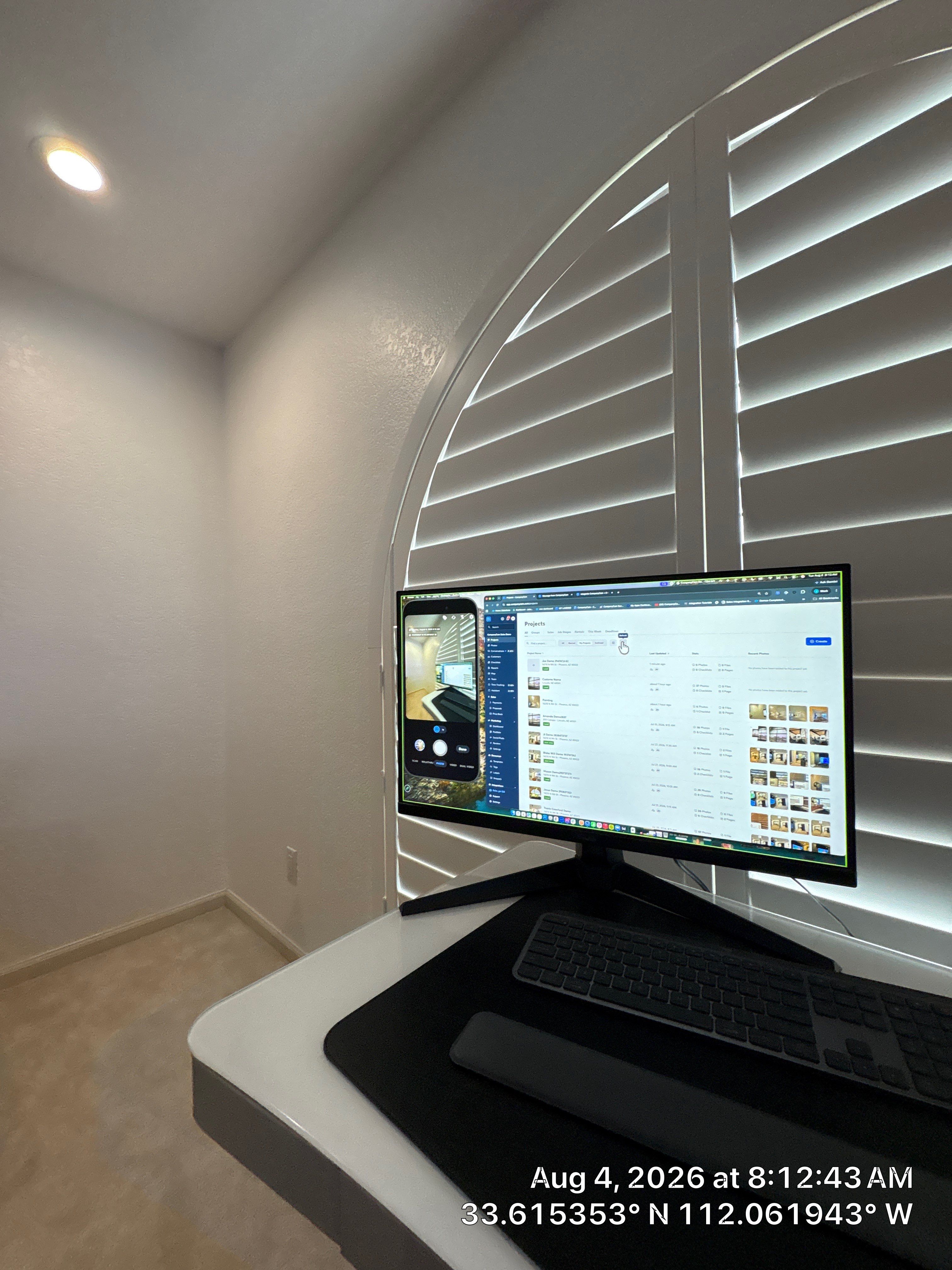 Phoenix Home Office Setup with Custom Arched Plantation Shutters by CompanyCam Sales Demo
