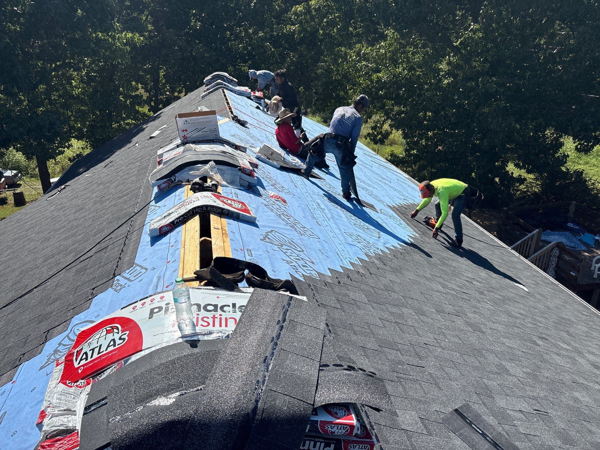 Residential Roof + Gutters & Downspouts Install  by Titan Commercial & Residential Roofing 
