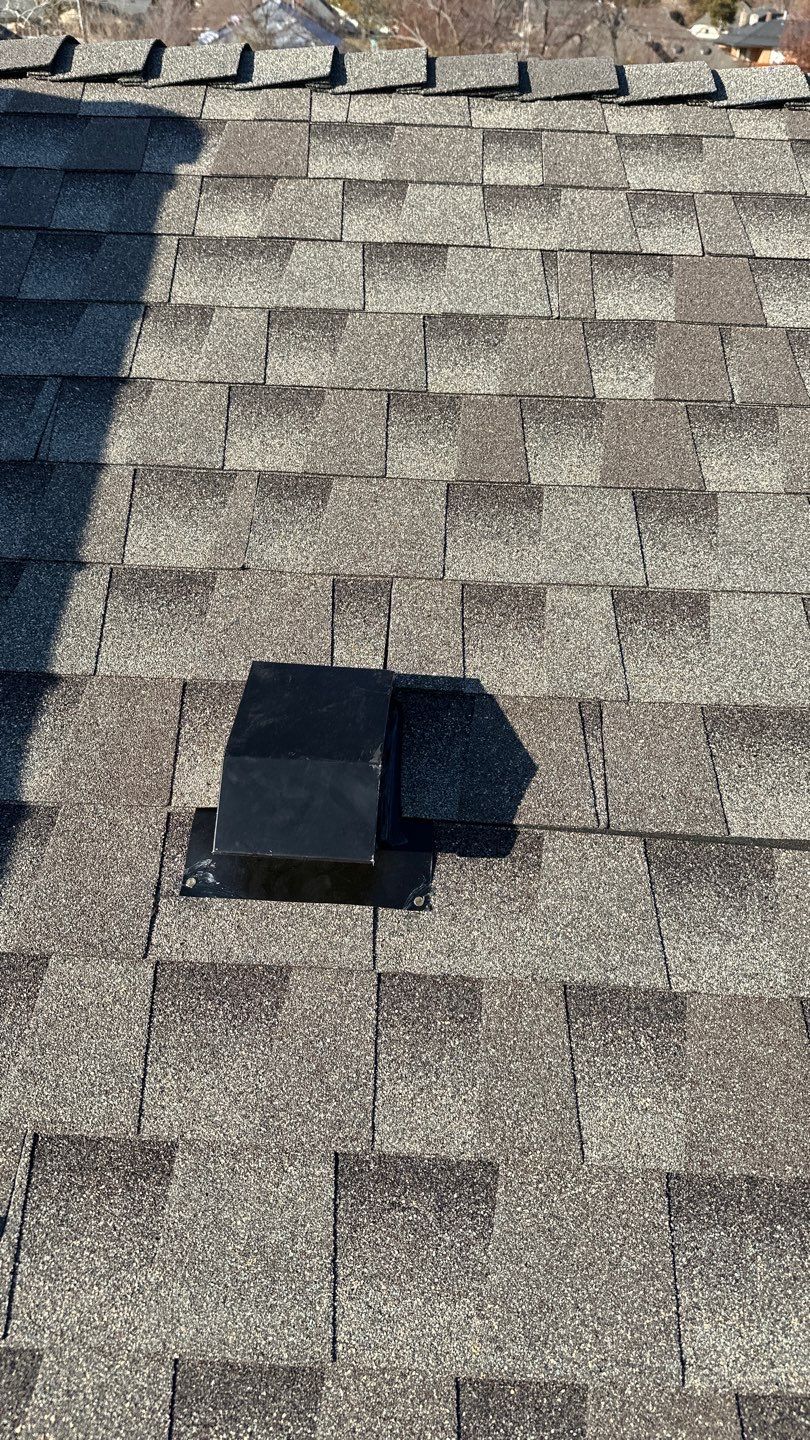 roof, skylight, and vent replacement in Edmond by McCann's Roofing and Construction