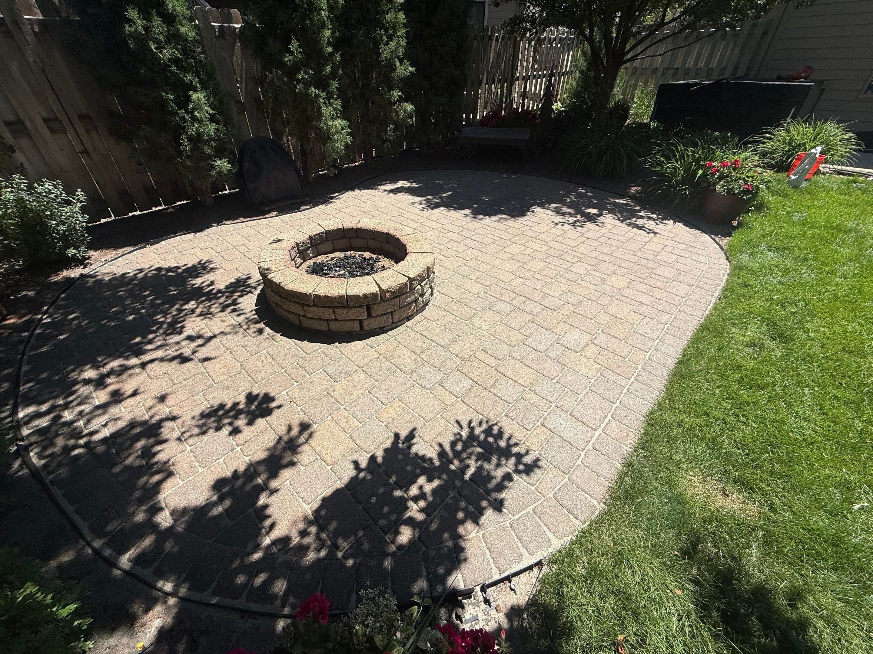 Textured Concrete Coating and Paver Patio Refresh in Sioux Falls by Select Painting, Coatings & Garage Cabinets