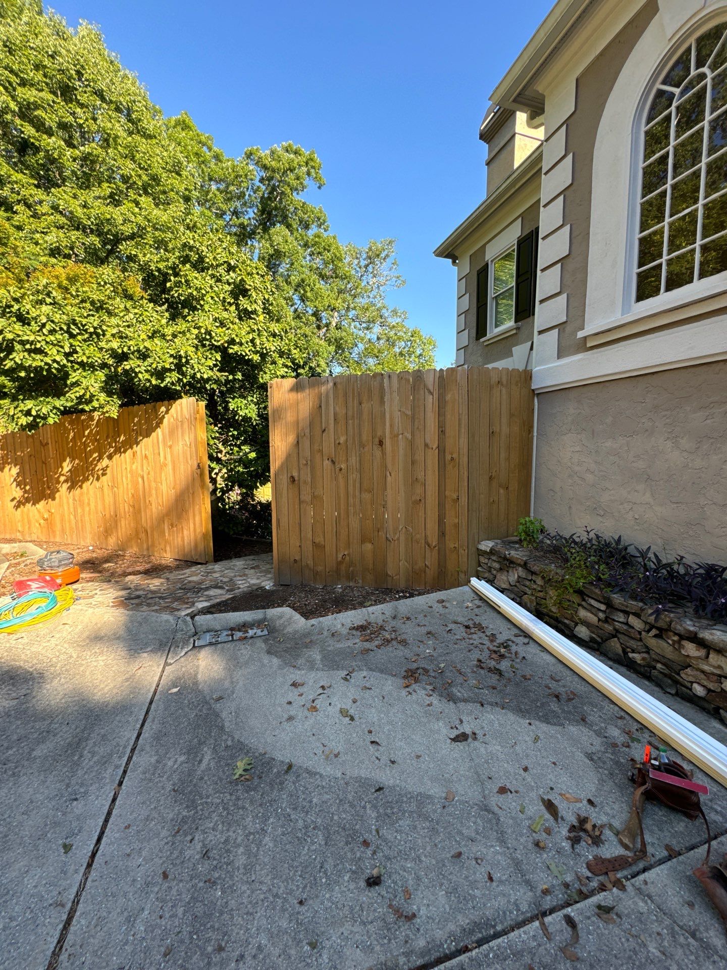Atlanta Exterior Refresh Featuring Wood Privacy Fence and Door Painting by Swift Home Renovations