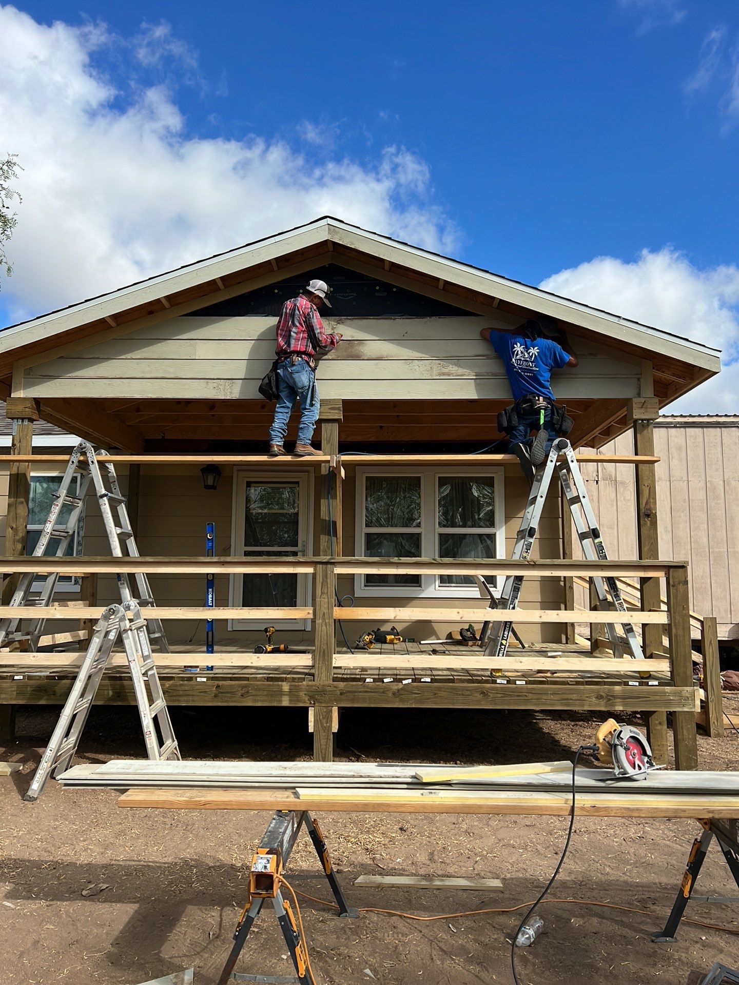 Front Porch Sitt'n by Bayfront Roofing and Construction