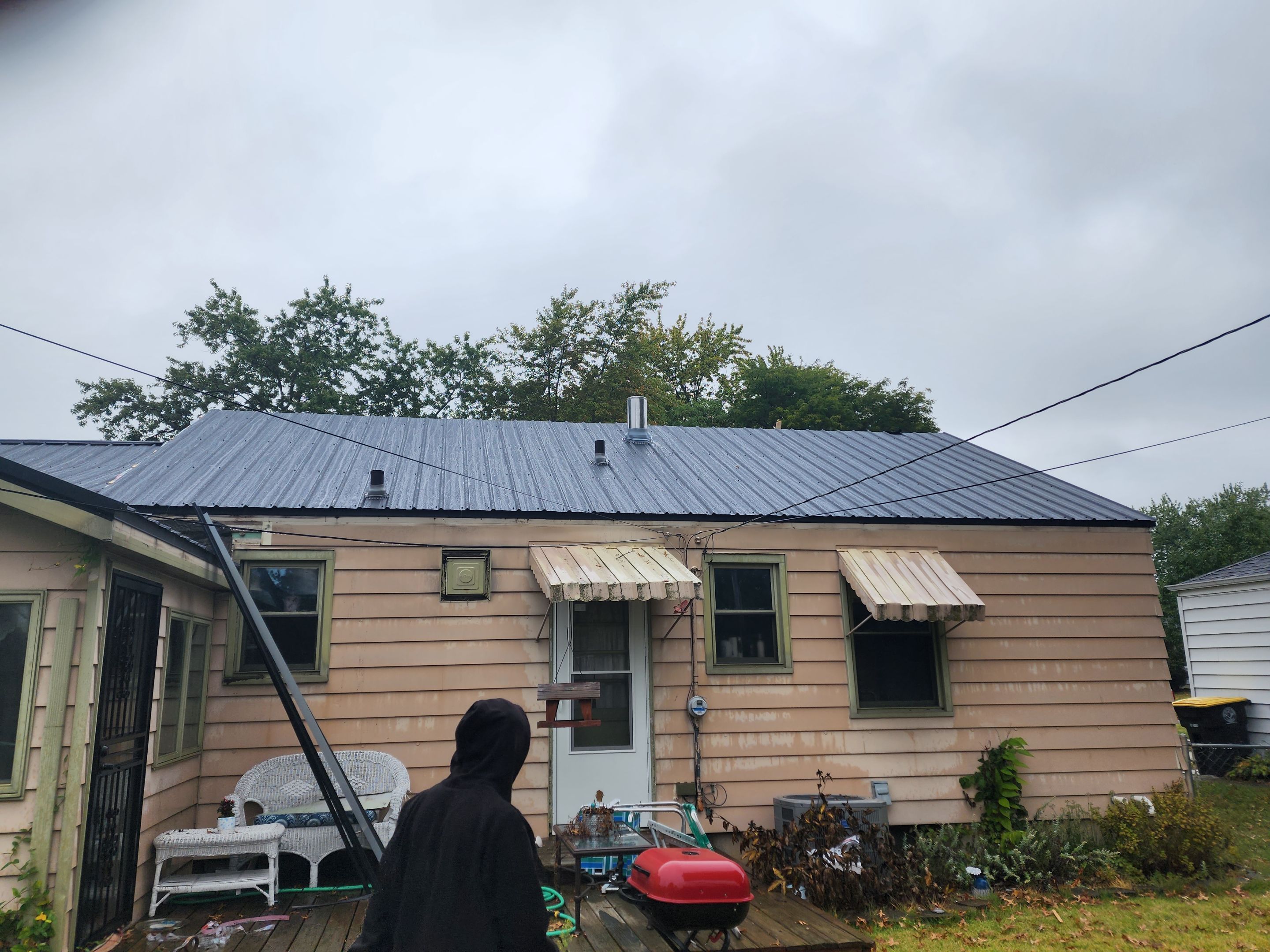 Residential Roofing Installation using Exposed Fastener Metal Roof by 4Ever Metal Roofing