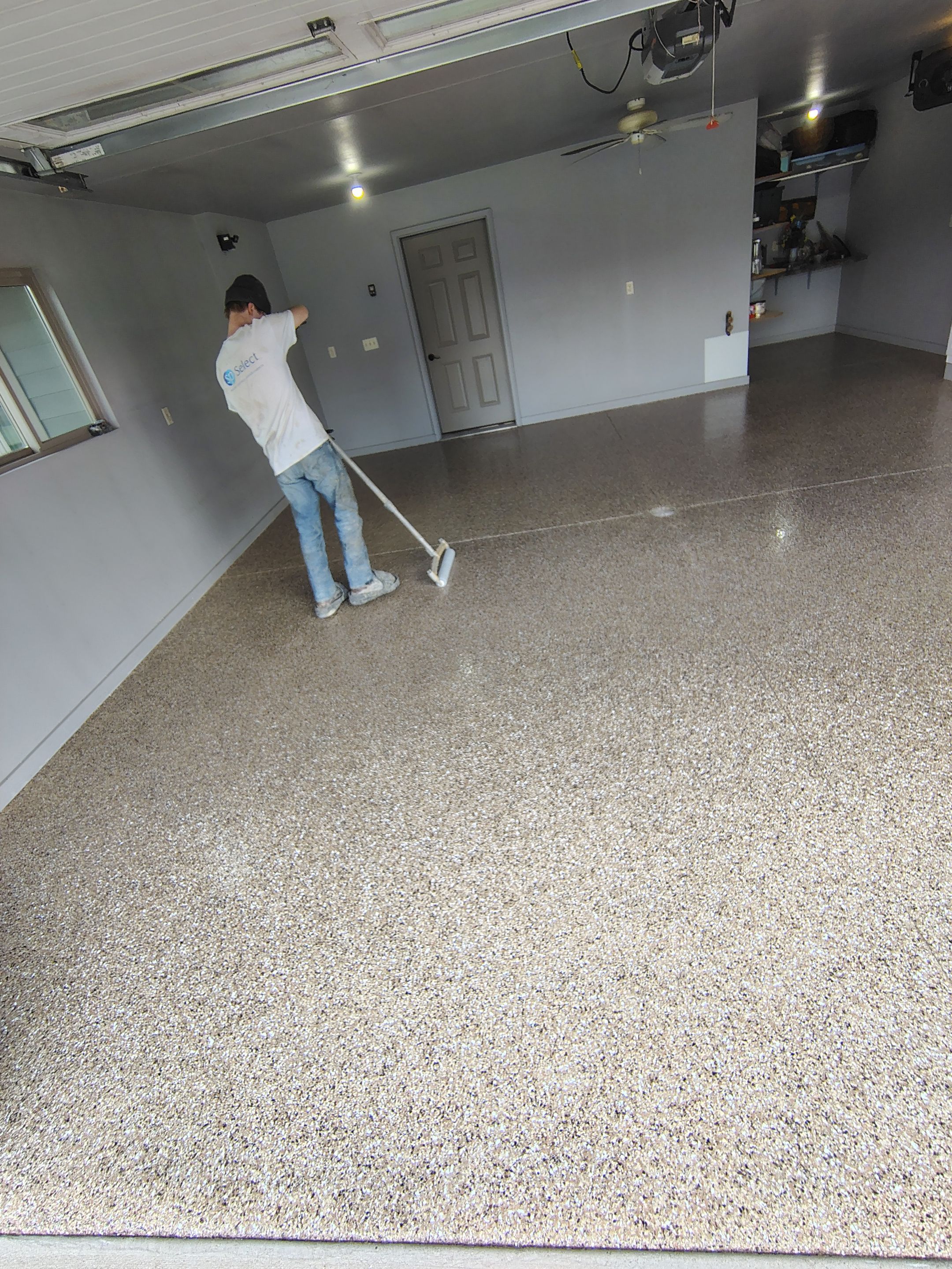Multi-Colored Speckled Epoxy Concrete Coating for Residential Garage by Select Painting, Coatings & Garage Cabinets