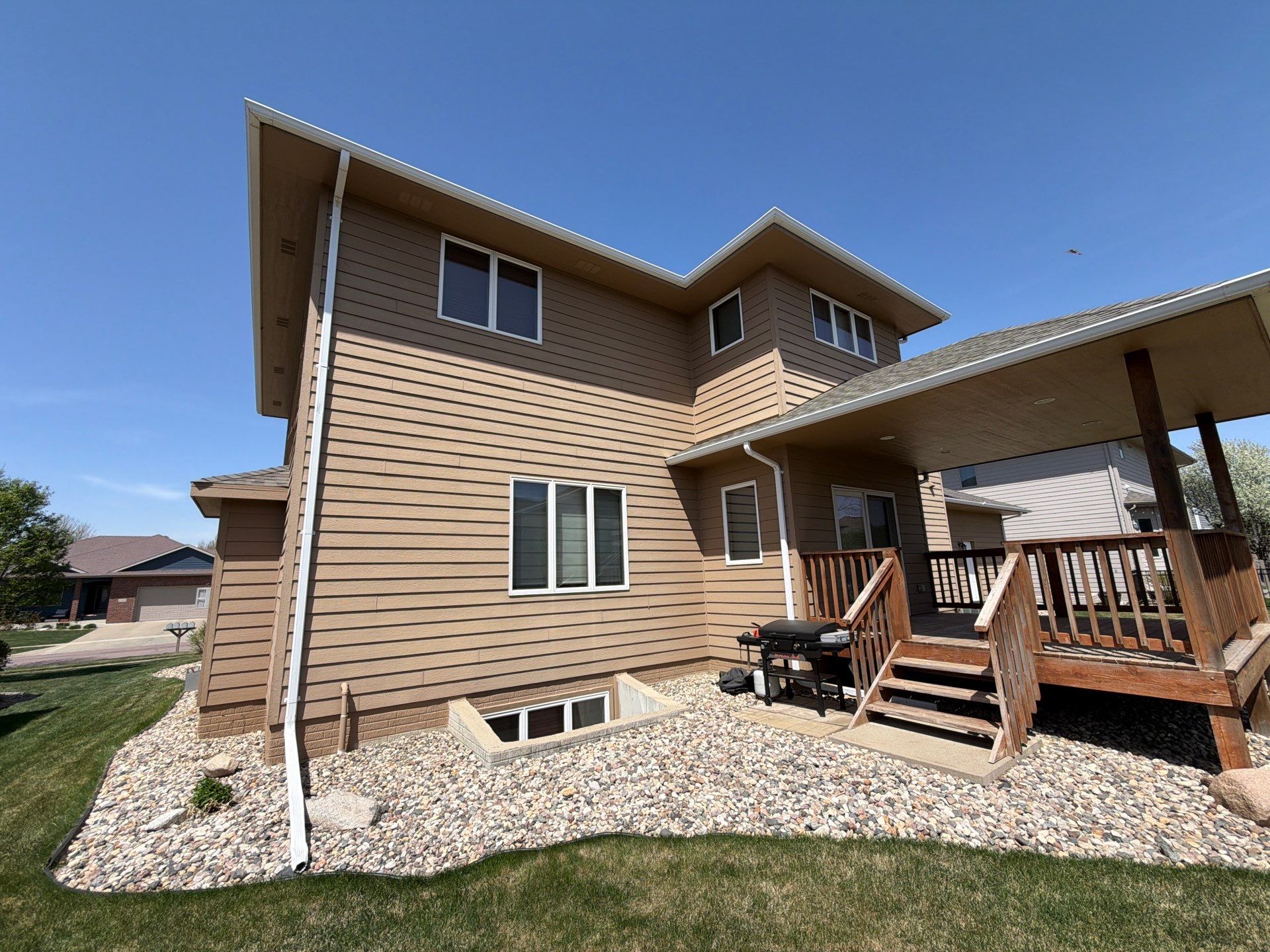 Full Exterior House Painting and Deck Staining in Sioux Falls by Select Painting, Coatings & Garage Cabinets