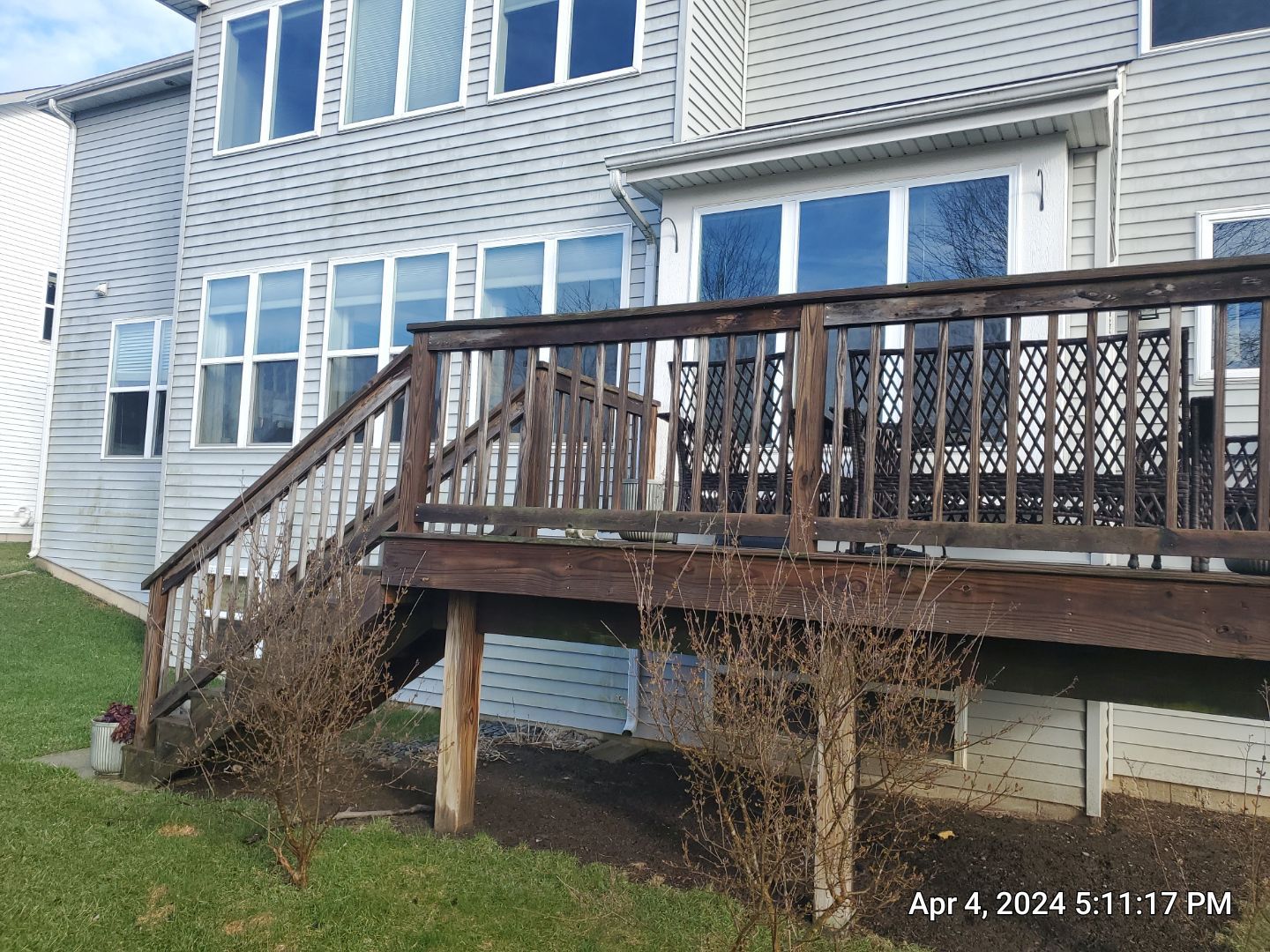 wood deck cleaning and staining by Northern Power Washing LLC.