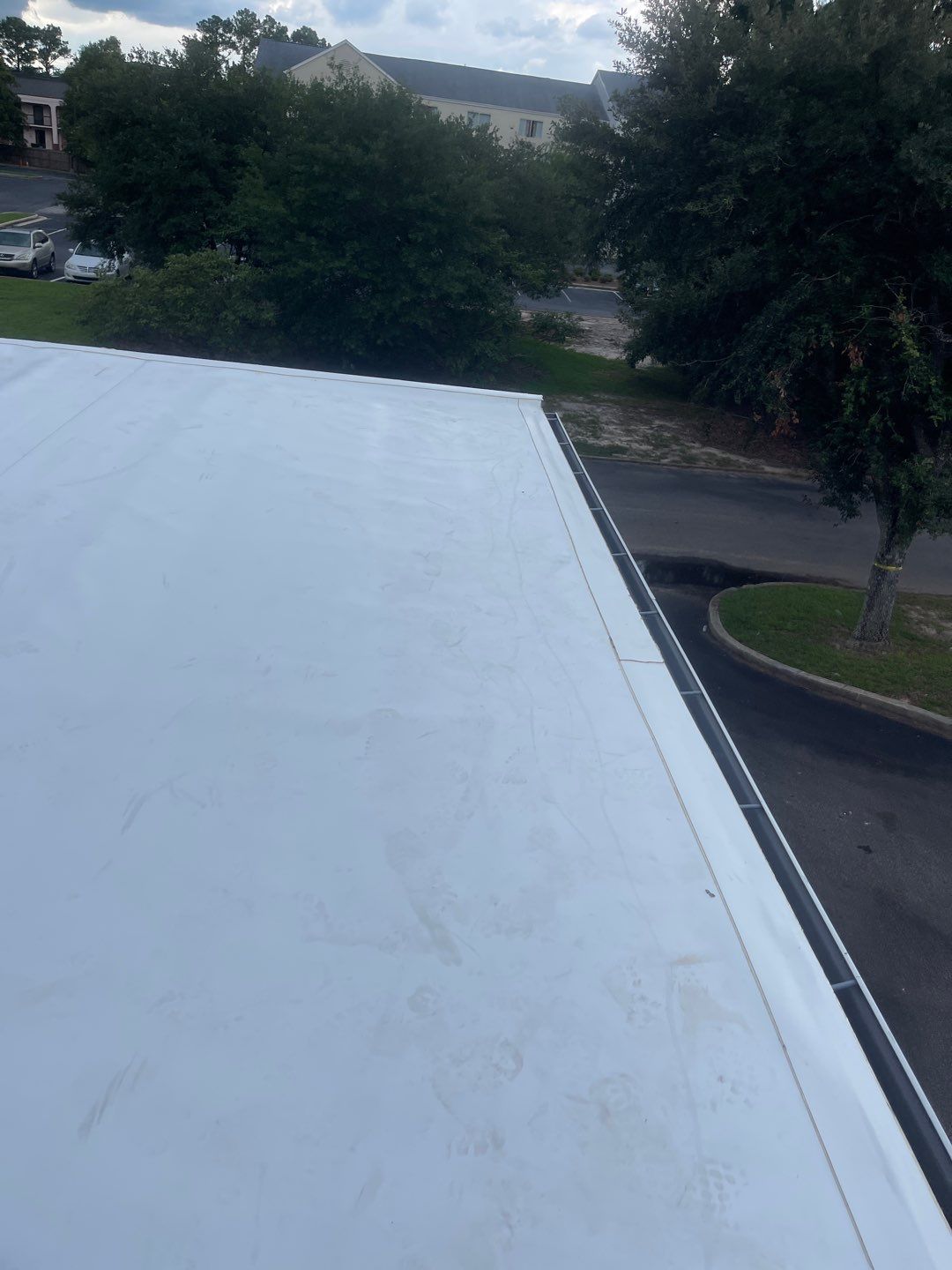 Commercial Roofing Installation using Roof Replacement by American Roofing & Construction LLC