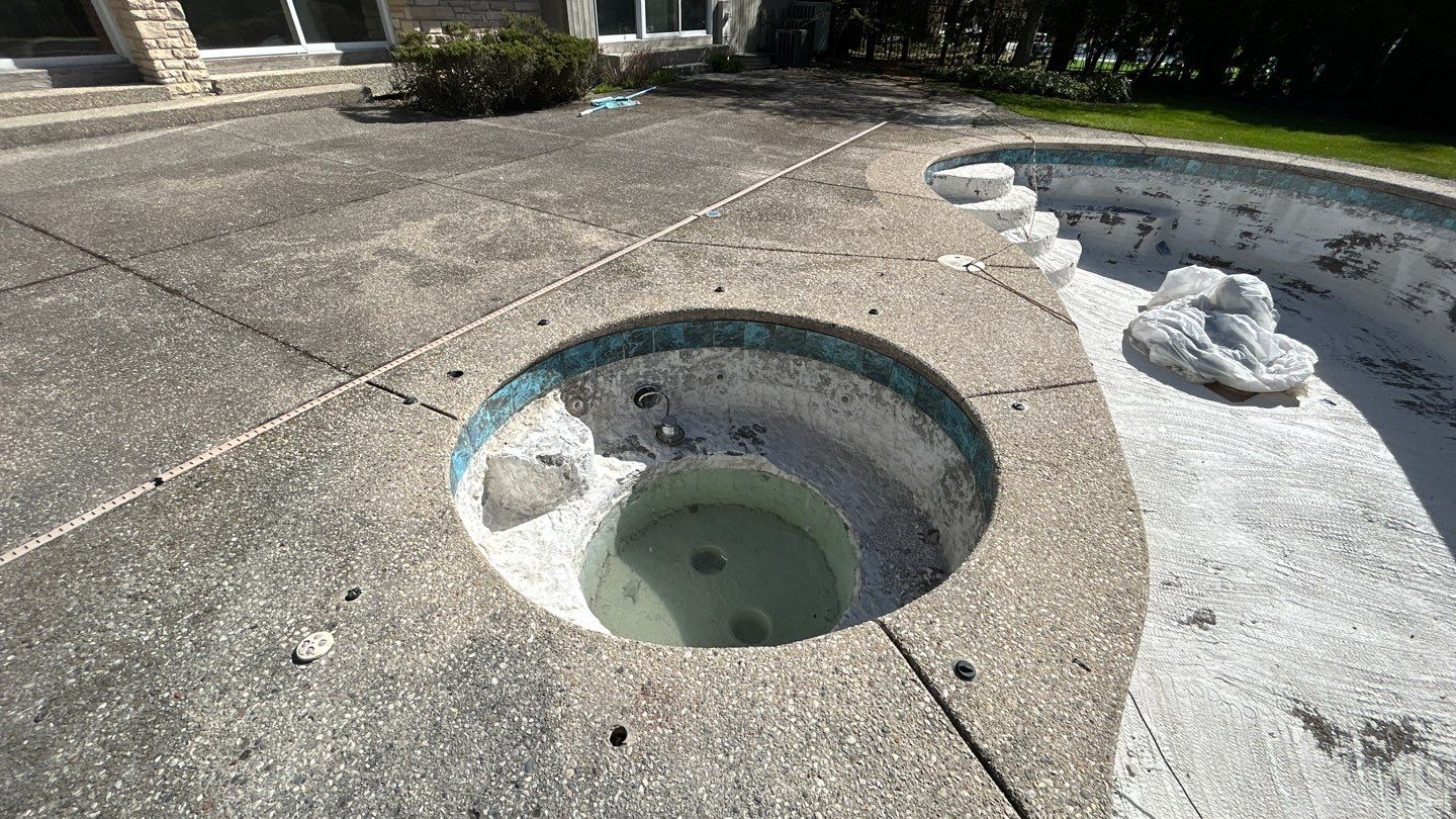 Aggregate Clean and seal using low gloss sealer by Northern Power Washing LLC.