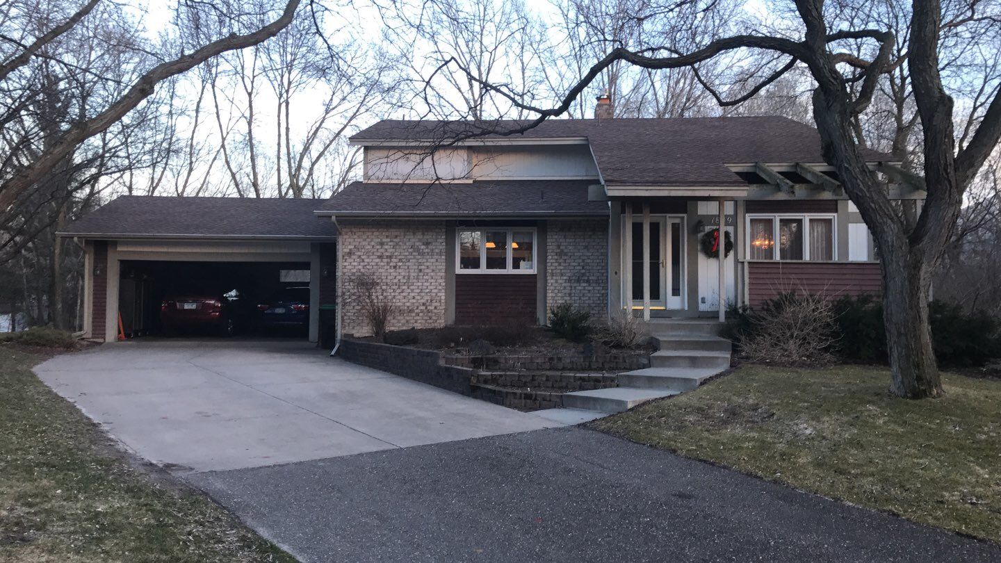 Siding Installation using LP SmartSide and Pella Vinyl Windows by MODERN EXTERIOR SYSTEMS