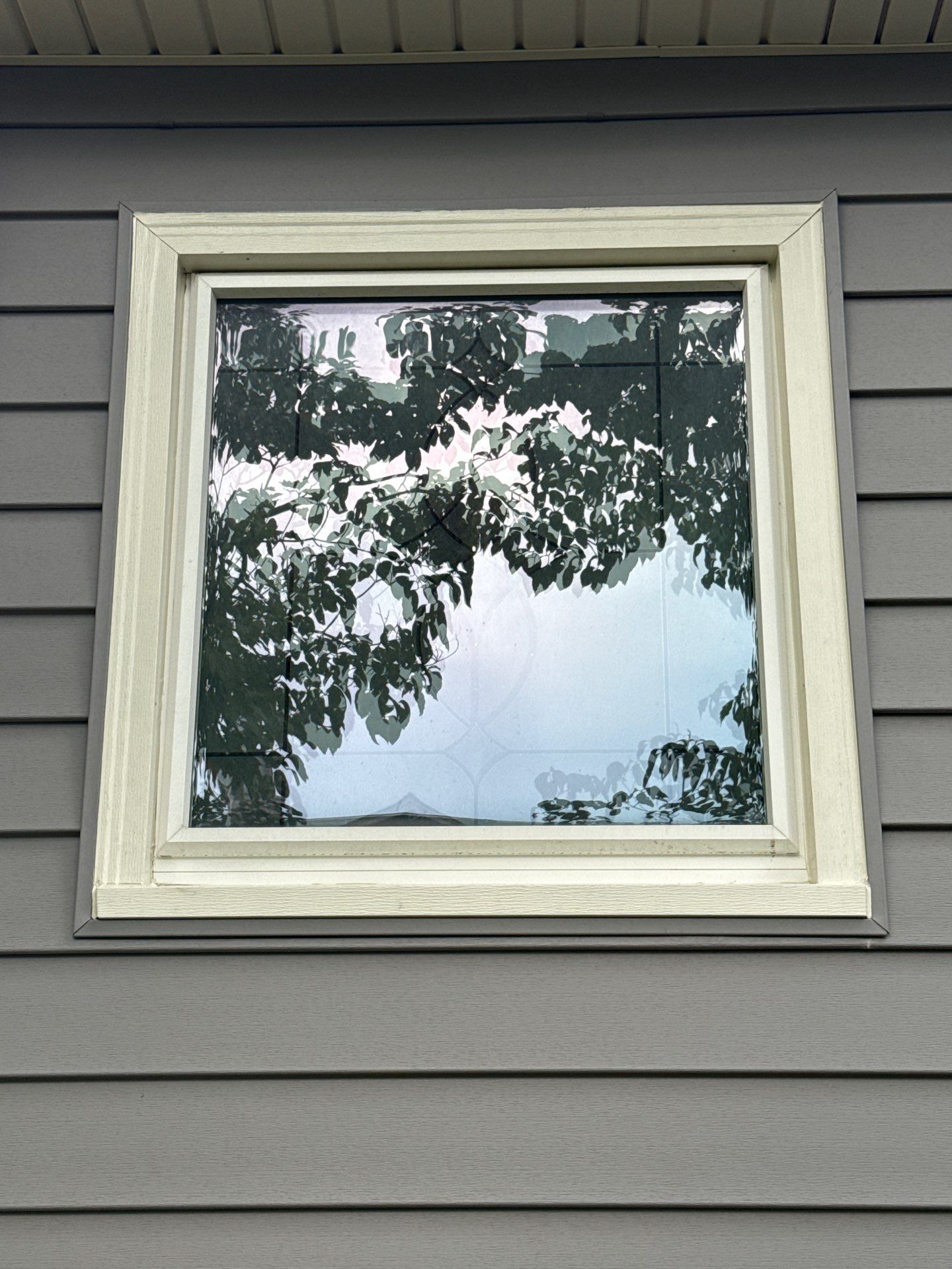 Whole Home Siding Replacement and Gutter Installation in Gladstone by EEC  Windows, Siding & Roofing 